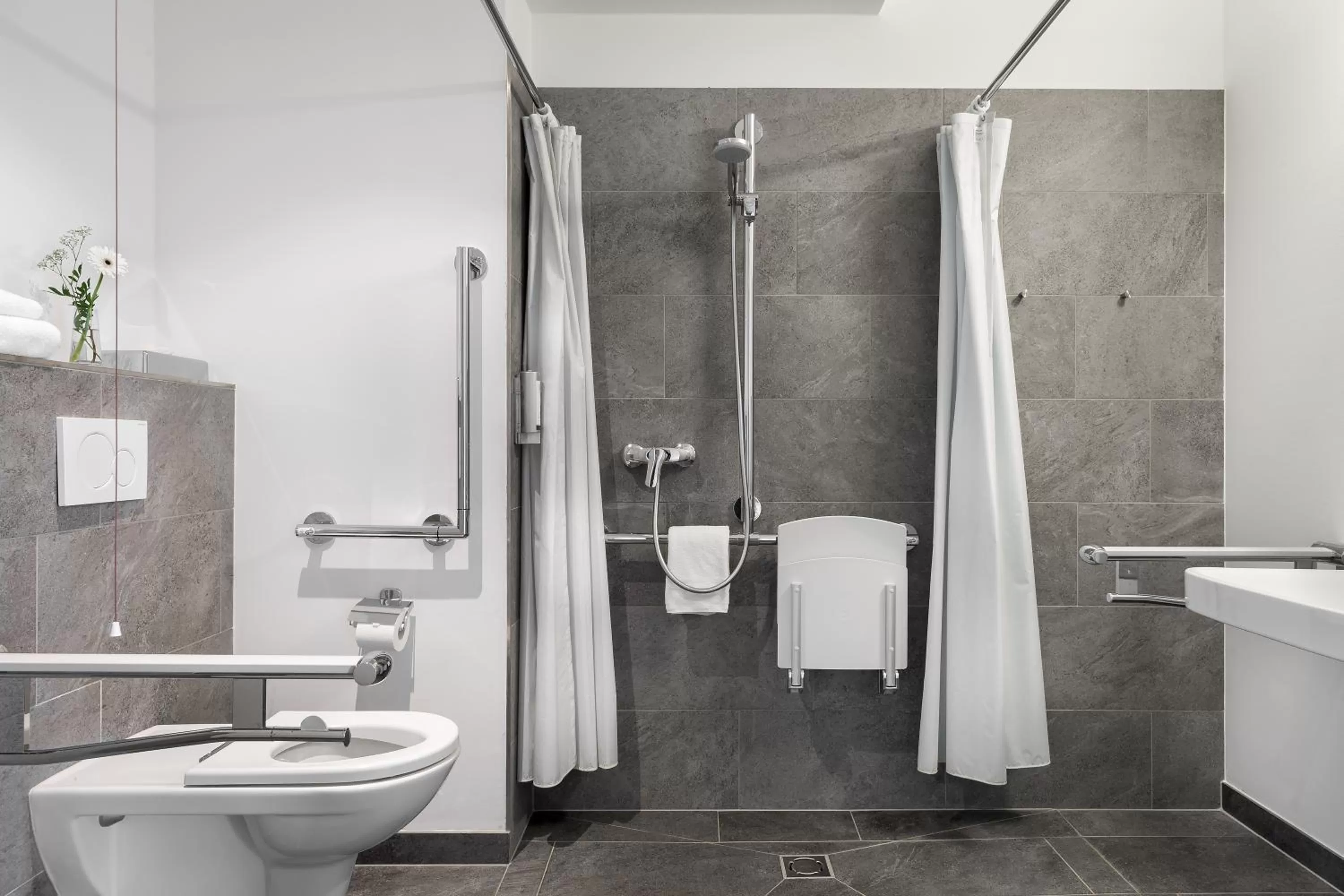 Decorative detail, Bathroom in Atomis Hotel Dachau Munich