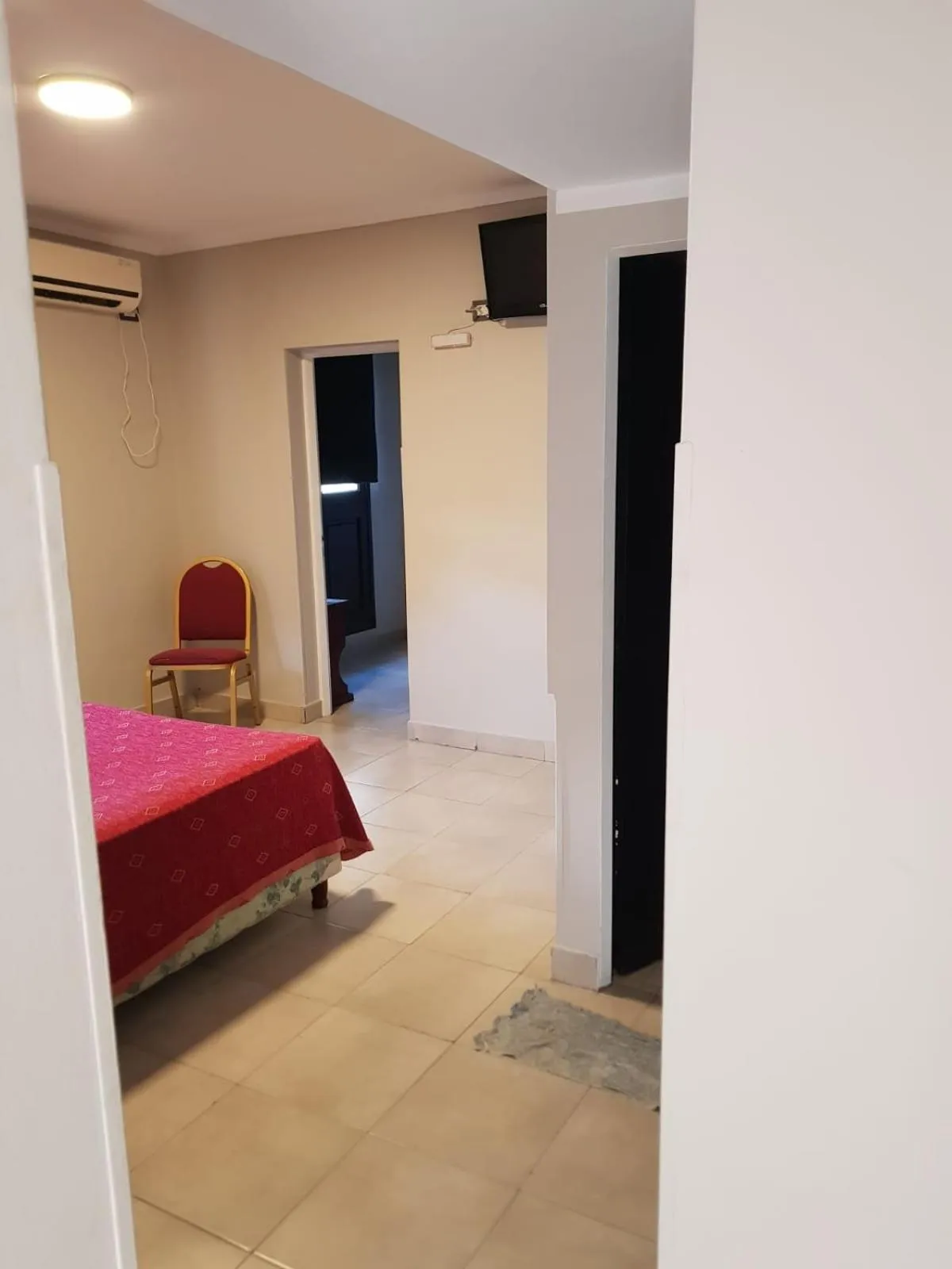 Bed in Hotel Marilian II