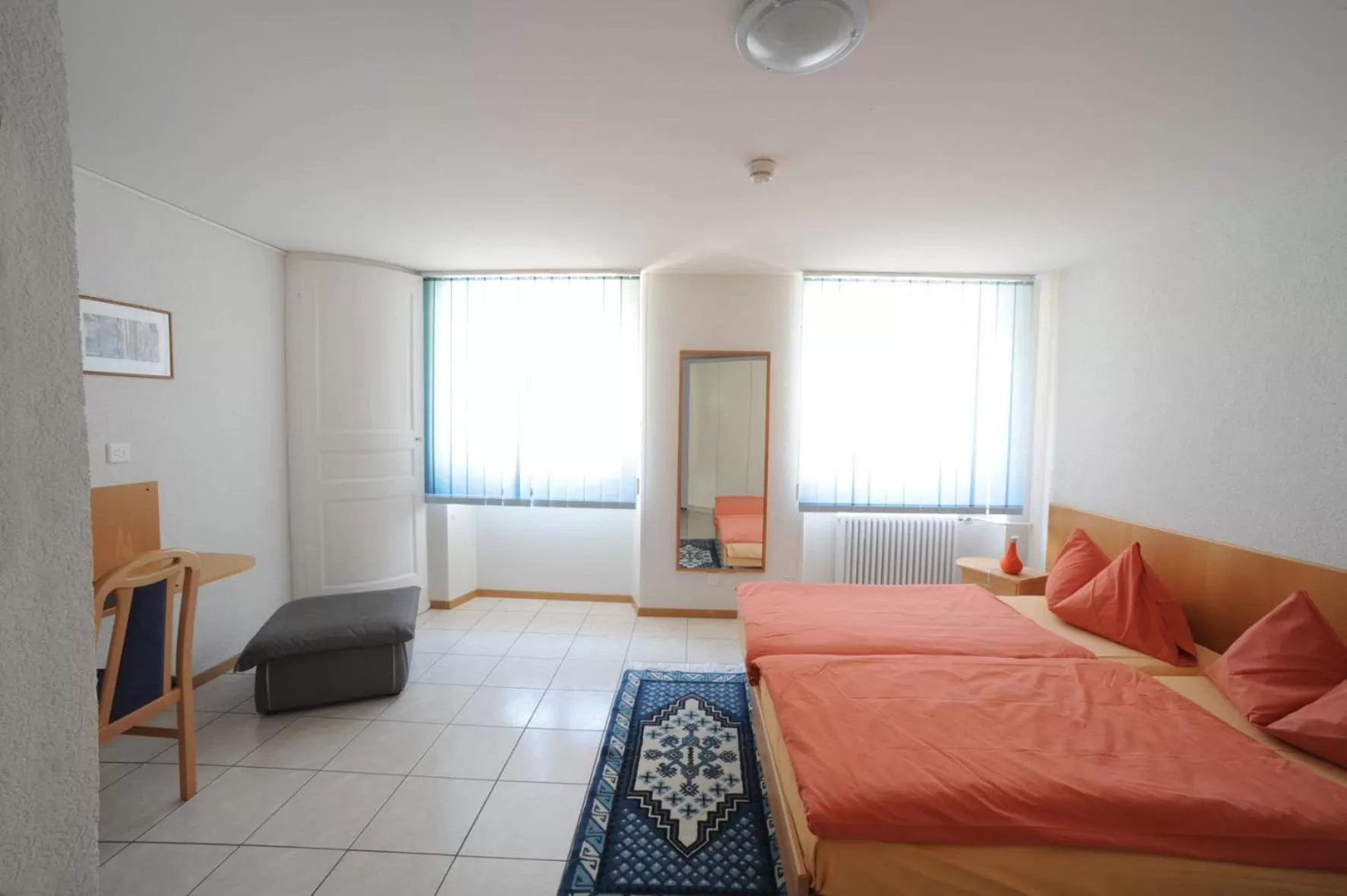 Bed in Chez Gilles hôtel resto bar SA