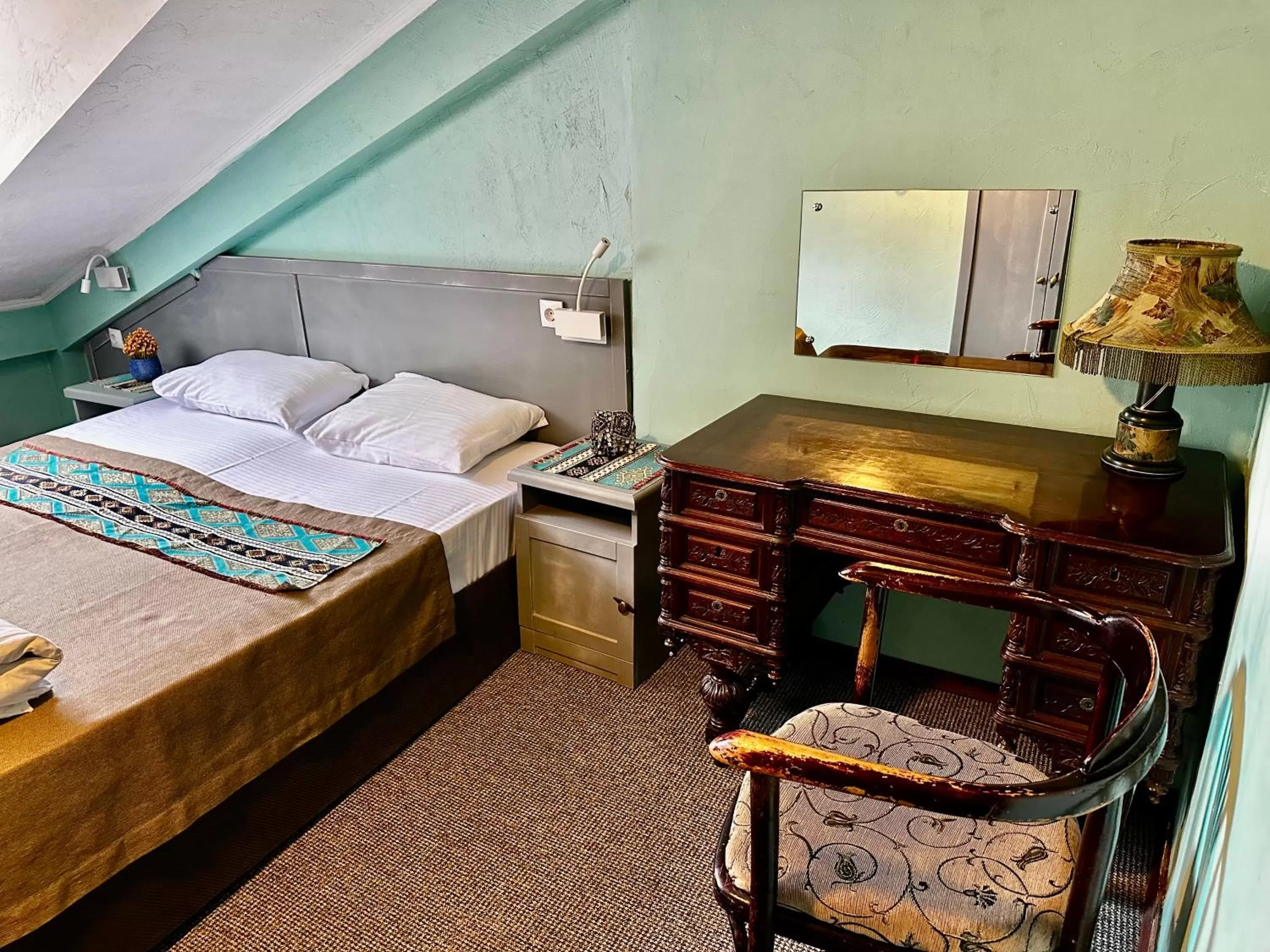 Bed in Kindli Boutique Hotel