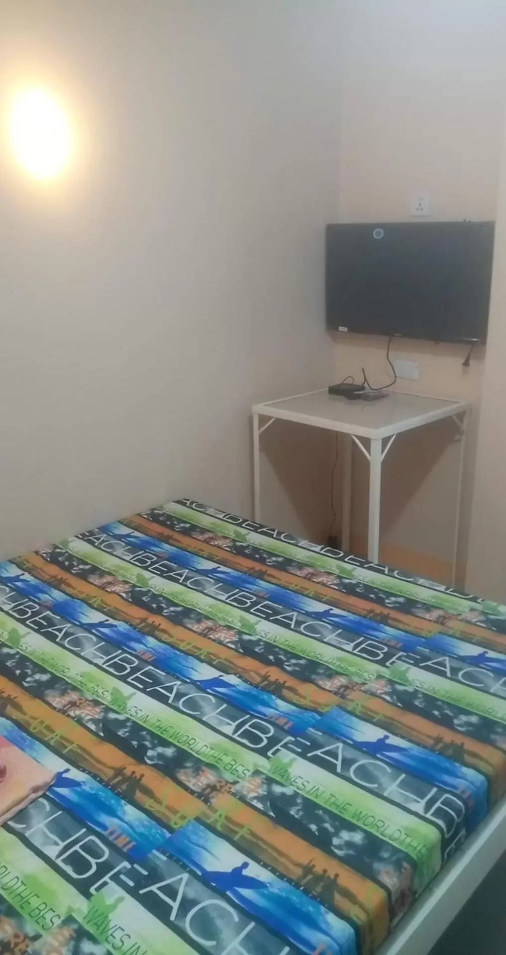 Bed in ROBIE'S TRANSIENTS ROOMS