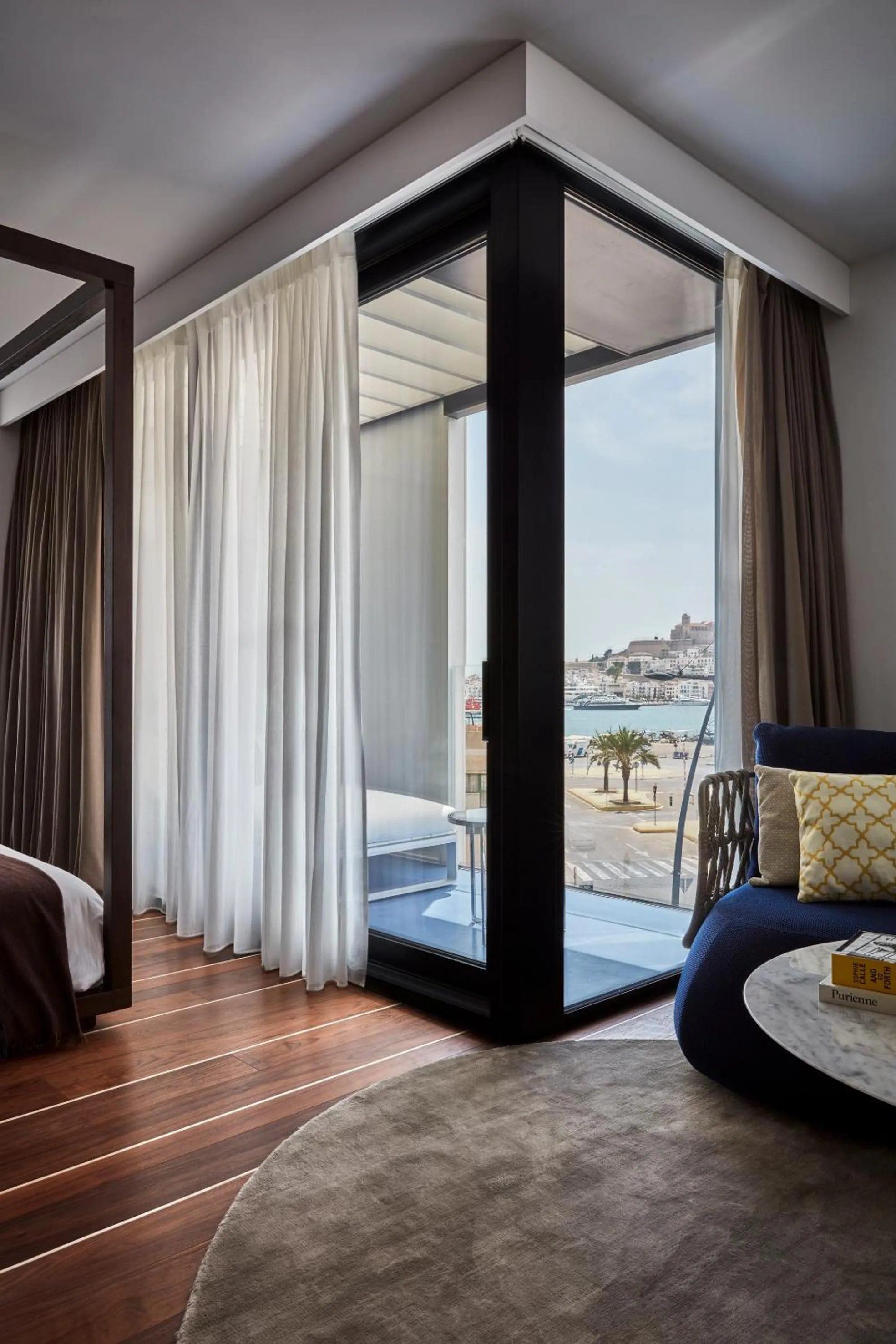 Seating area, Bed in Sir Joan Hotel, part of Sircle Collection