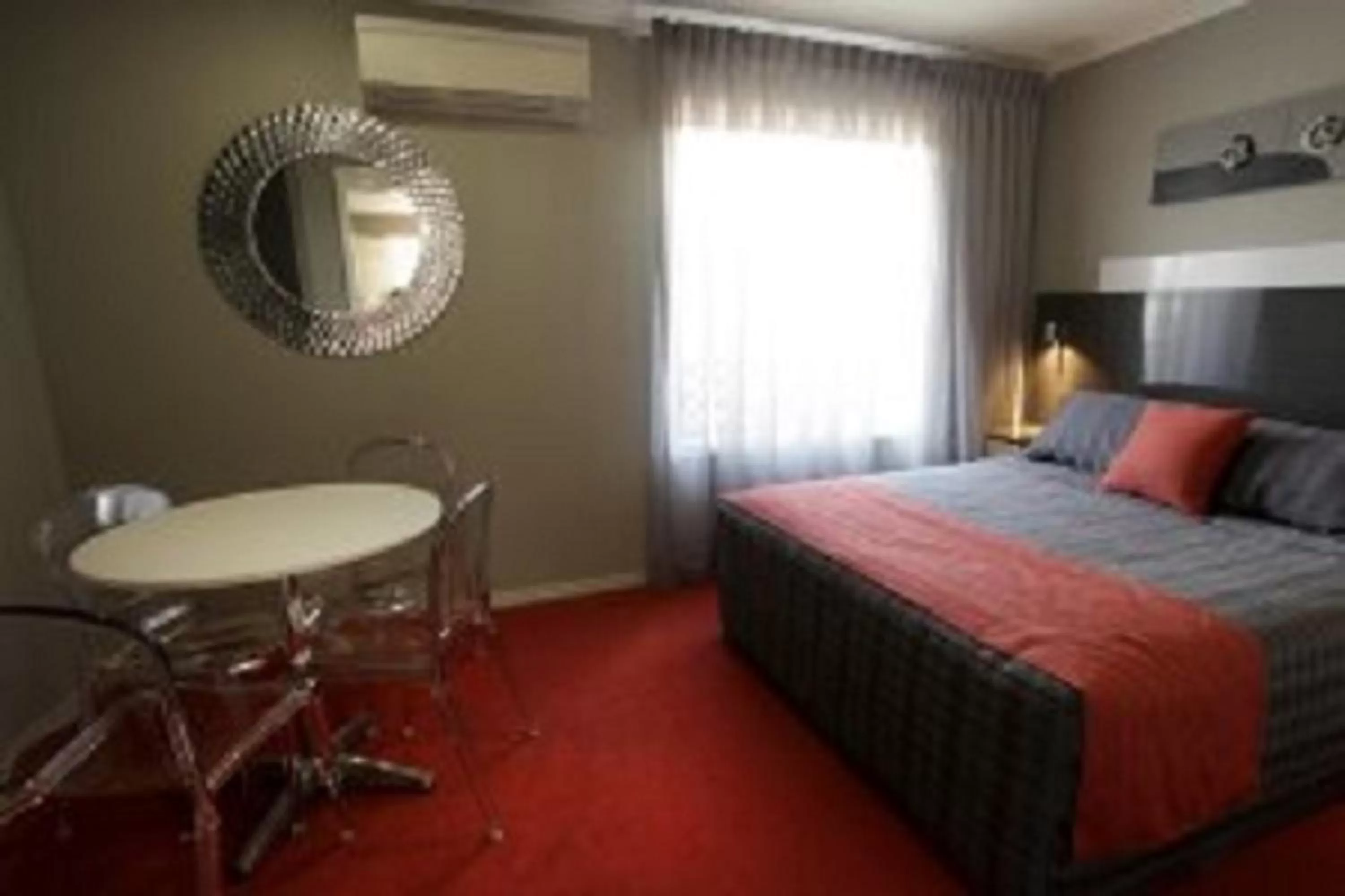 Bedroom, Bed in Cattlemans Country Motor Inn & Serviced Apartments