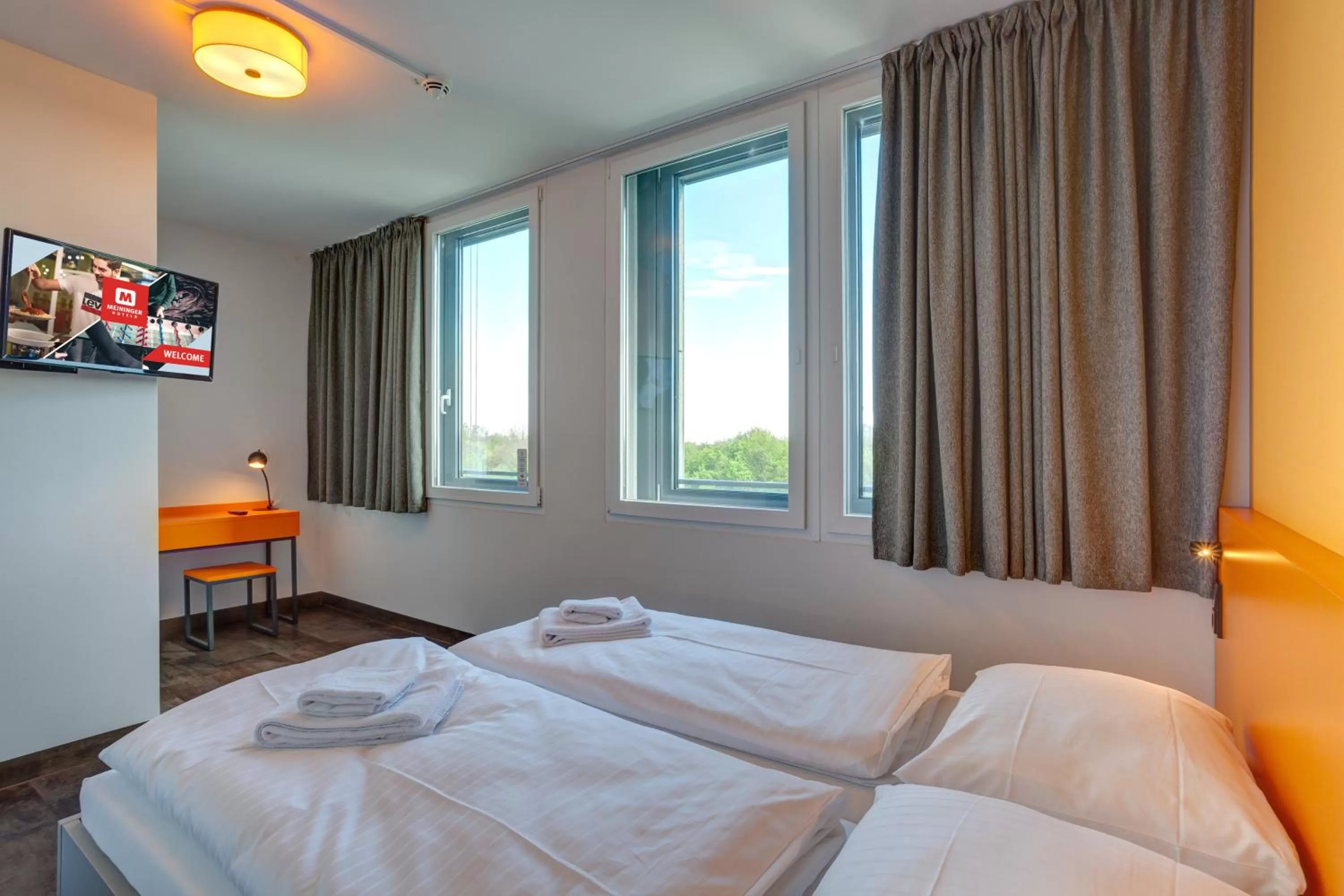 Photo of the whole room, Bed in MEININGER Hotel München Olympiapark