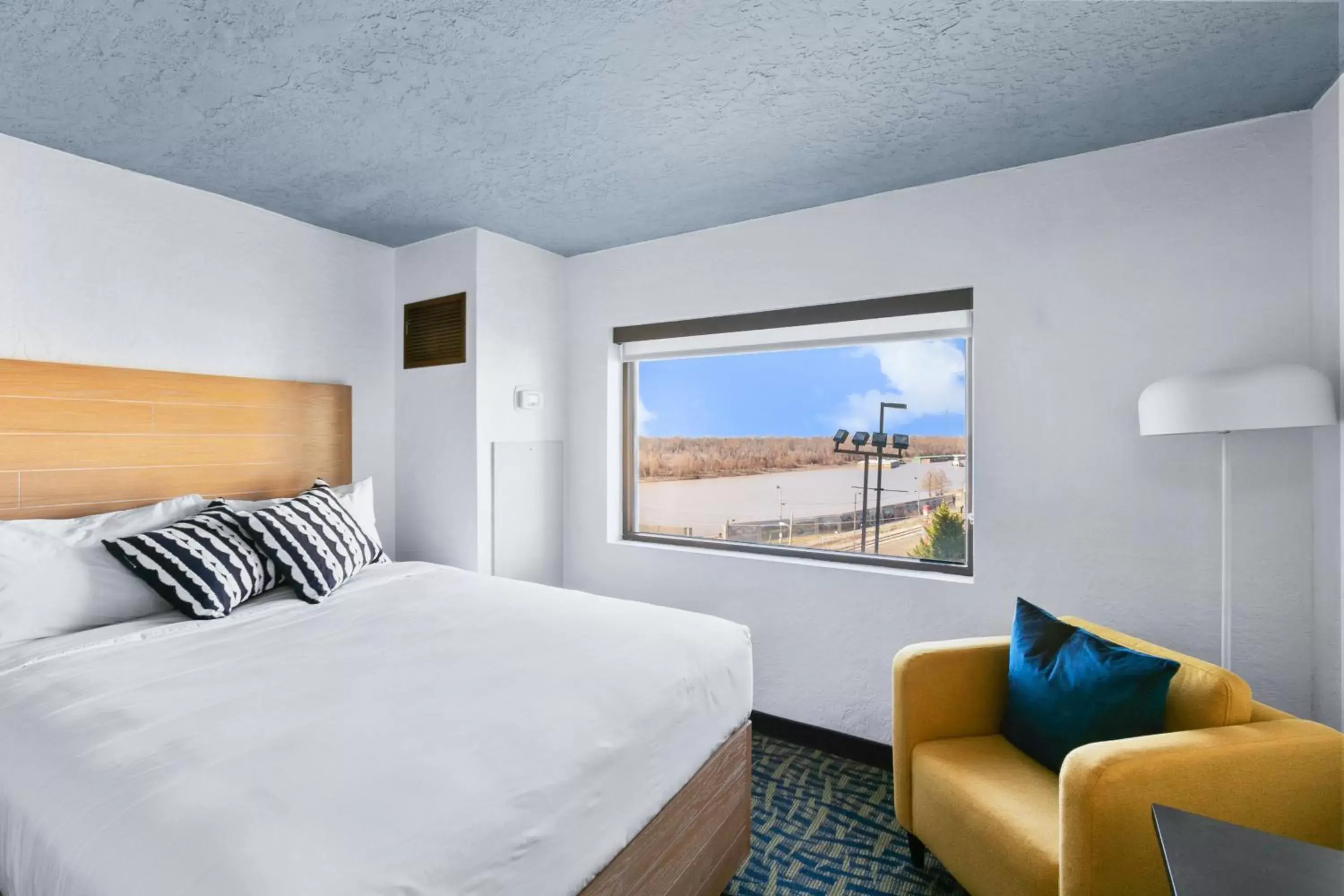 Room with Two Queen Beds and Mobility/Hearing Access and Roll-In Shower, Non-Smoking in Mulberry, a Wyndham Hotel Room with Two Queen Beds and Mobility/Hearing Access and Roll-In Shower, Non-Smoking in Mulberry, a Wyndham Hotel