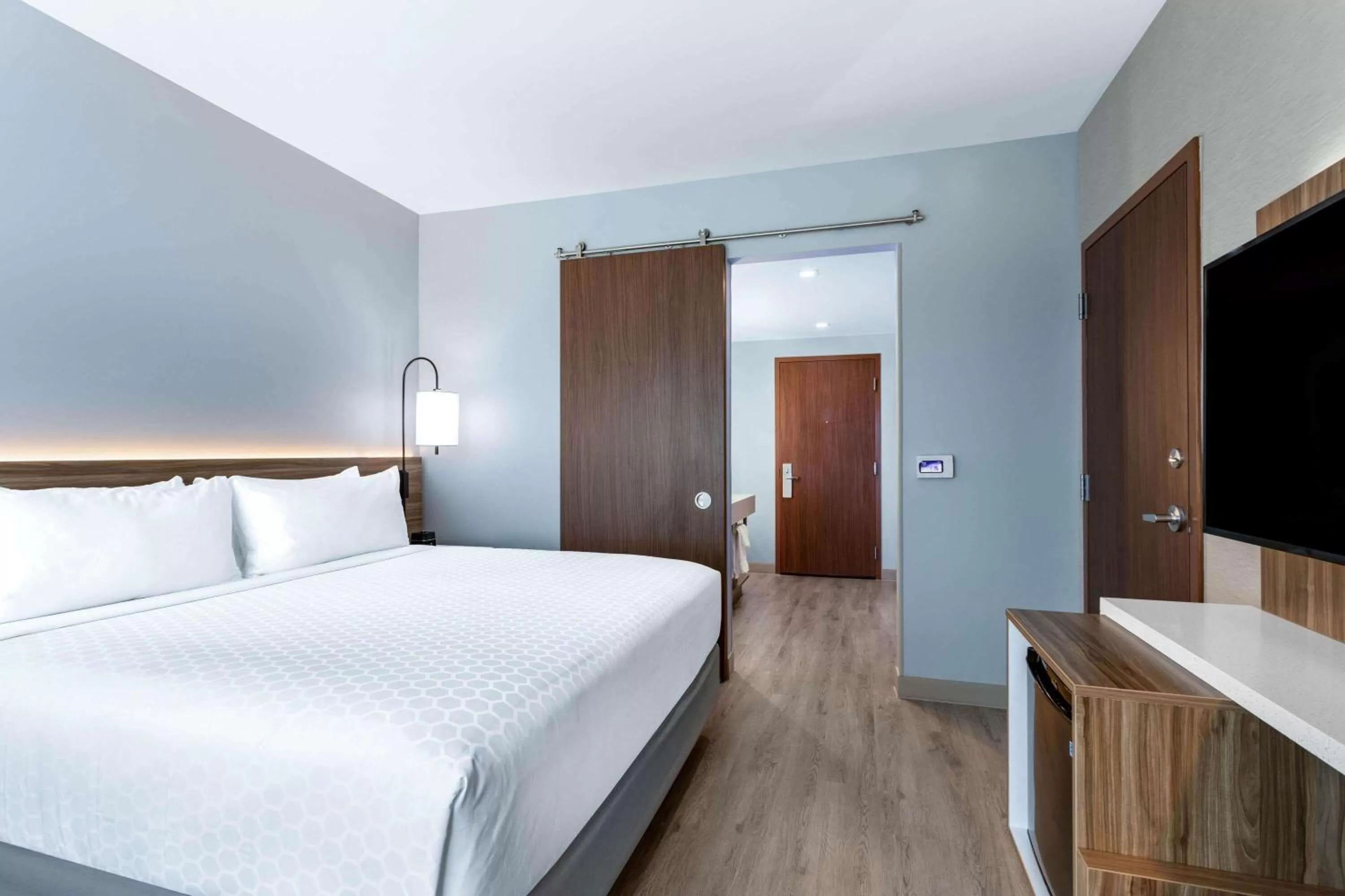 Photo of the whole room, Bed in Wyndham Garden Miami International Airport