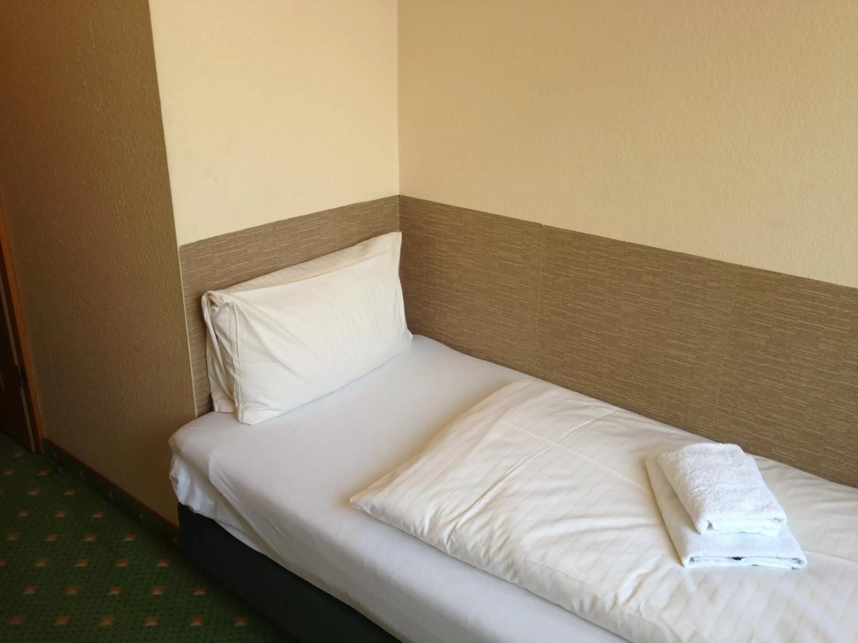 Bed in Hotel an der Marktkirche