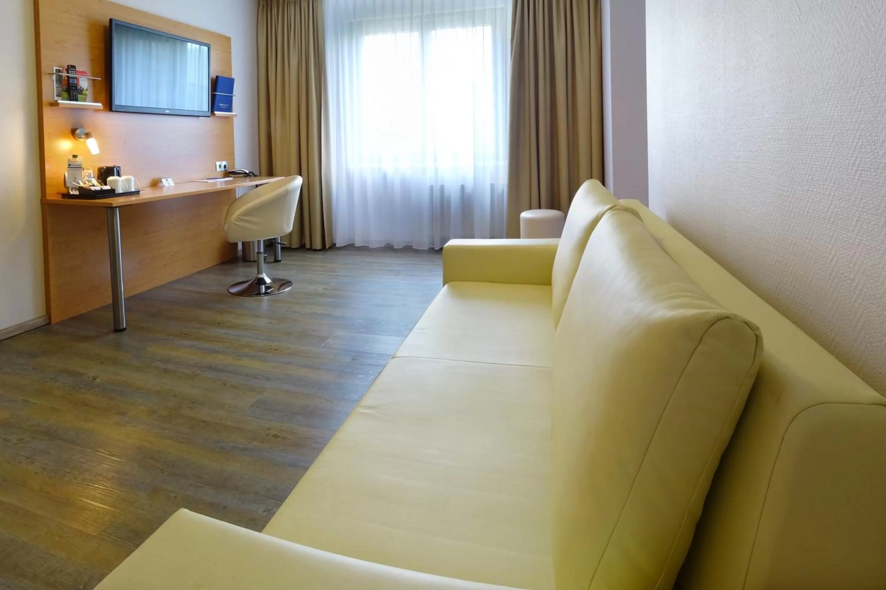 Photo of the whole room, Seating Area in Best Western Hotel Braunschweig