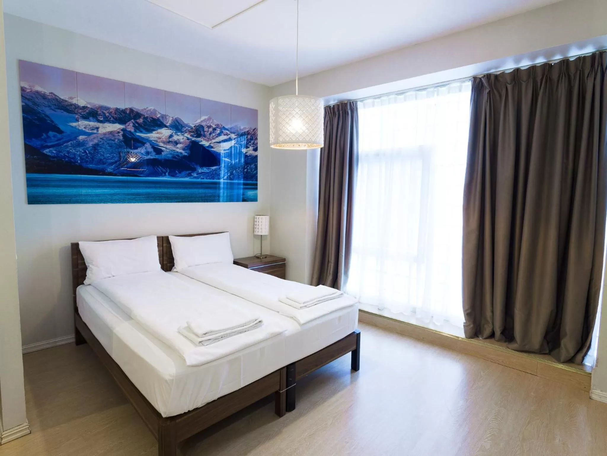 Bed in Central City Apartments