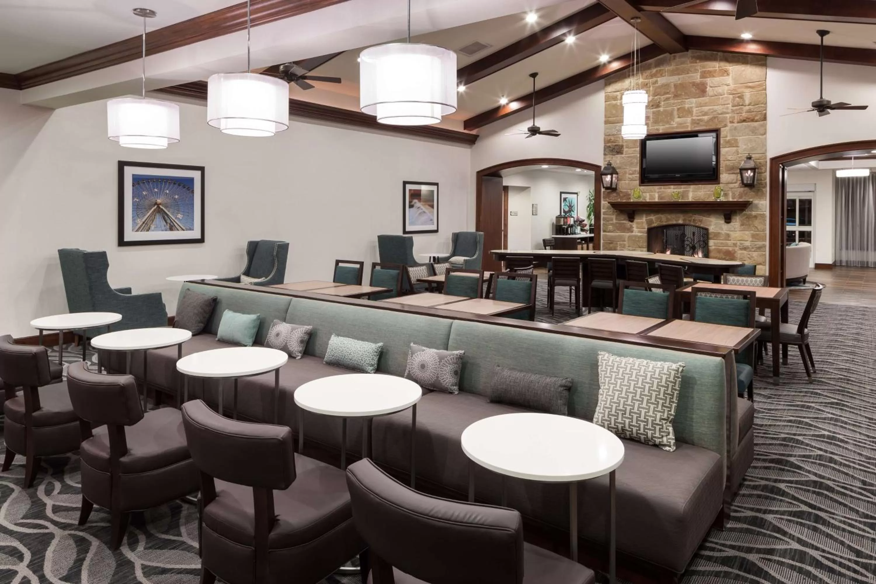 Communal lounge/ TV room in Homewood Suites by Hilton Denton