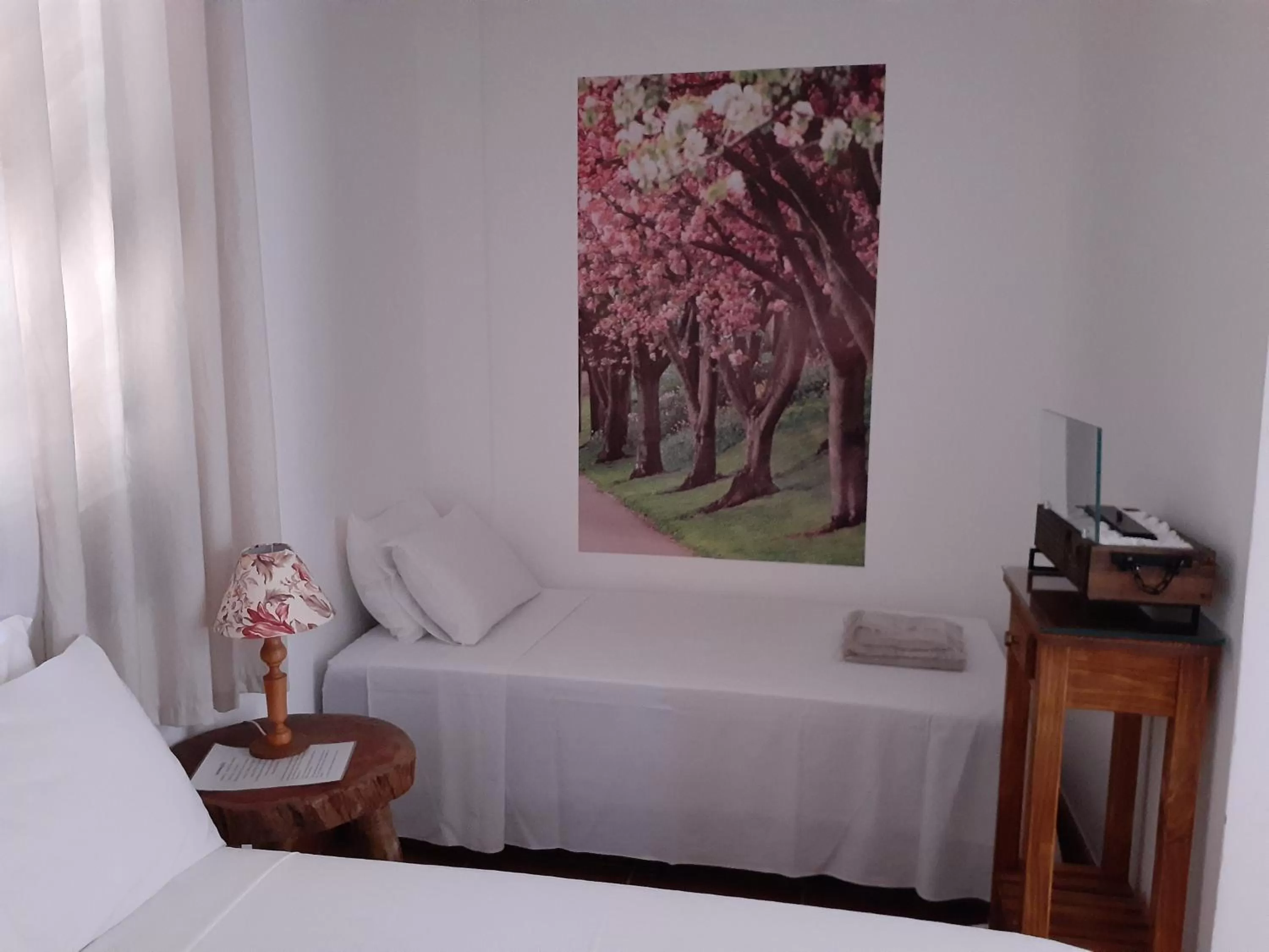 Bed in Pousada R.N.C. Nosso Paraíso