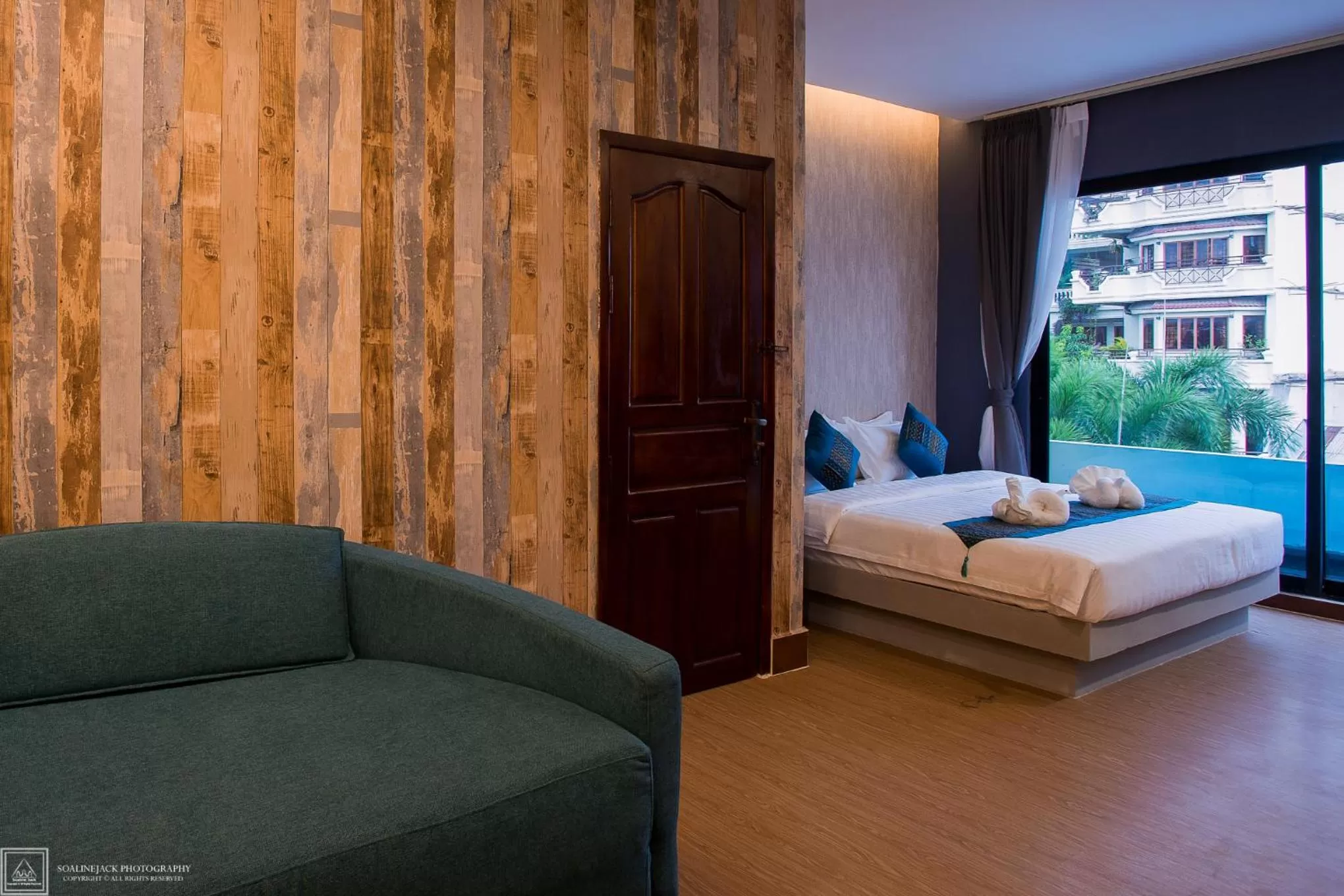 Photo of the whole room, Bed in Orussey One Boutique