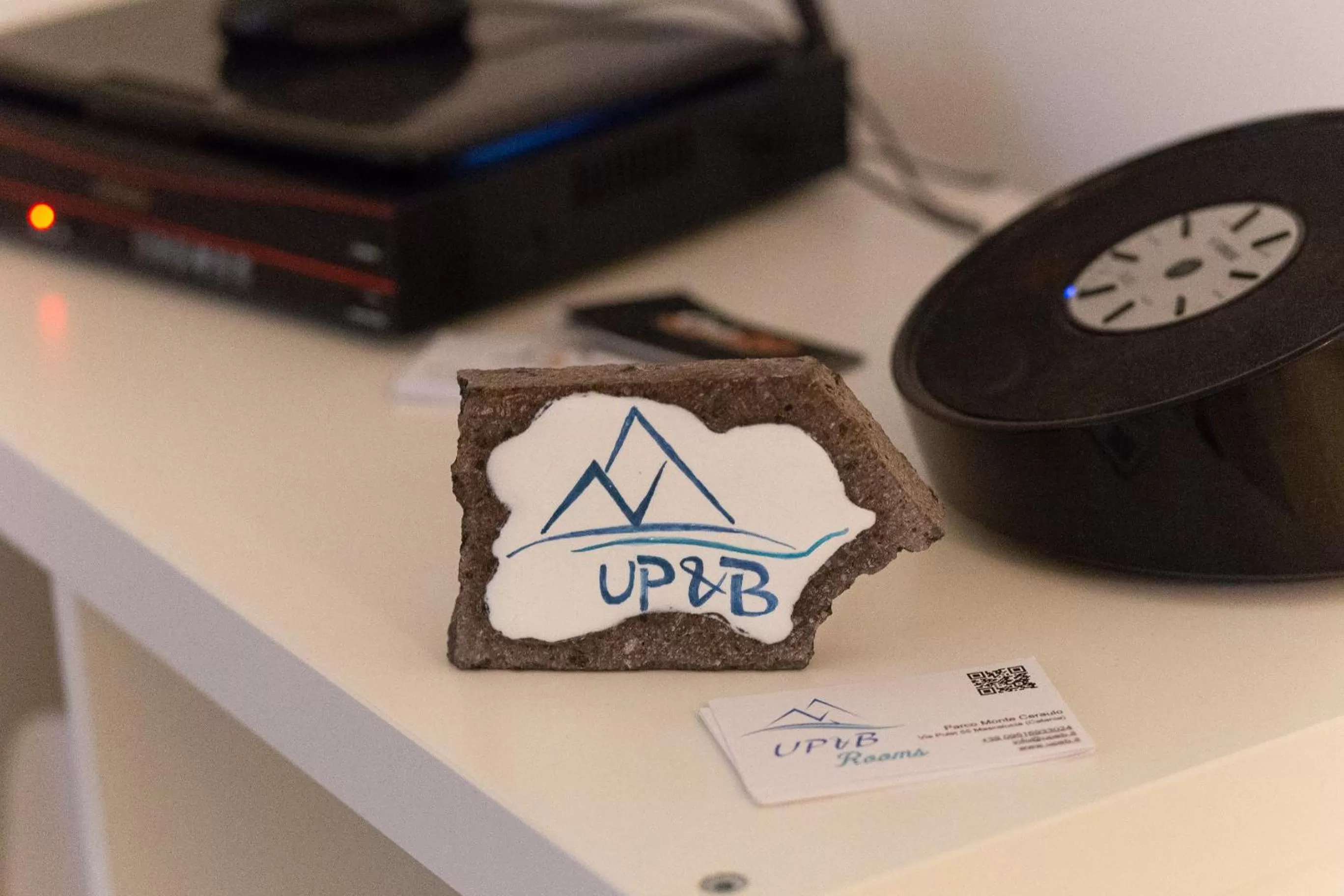 Logo/Certificate/Sign in UP&B Rooms Catania