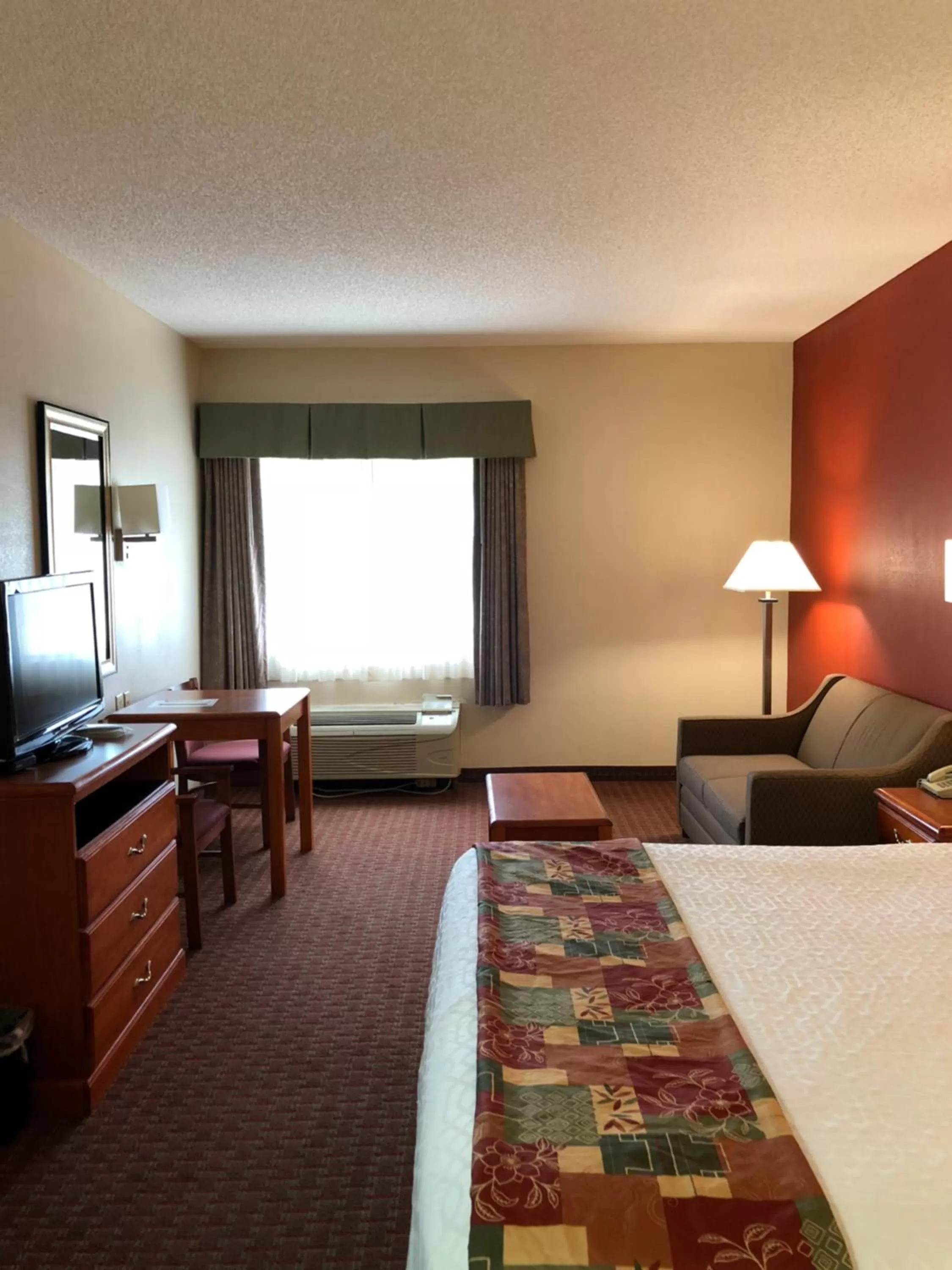 Bed in Millennium Inn