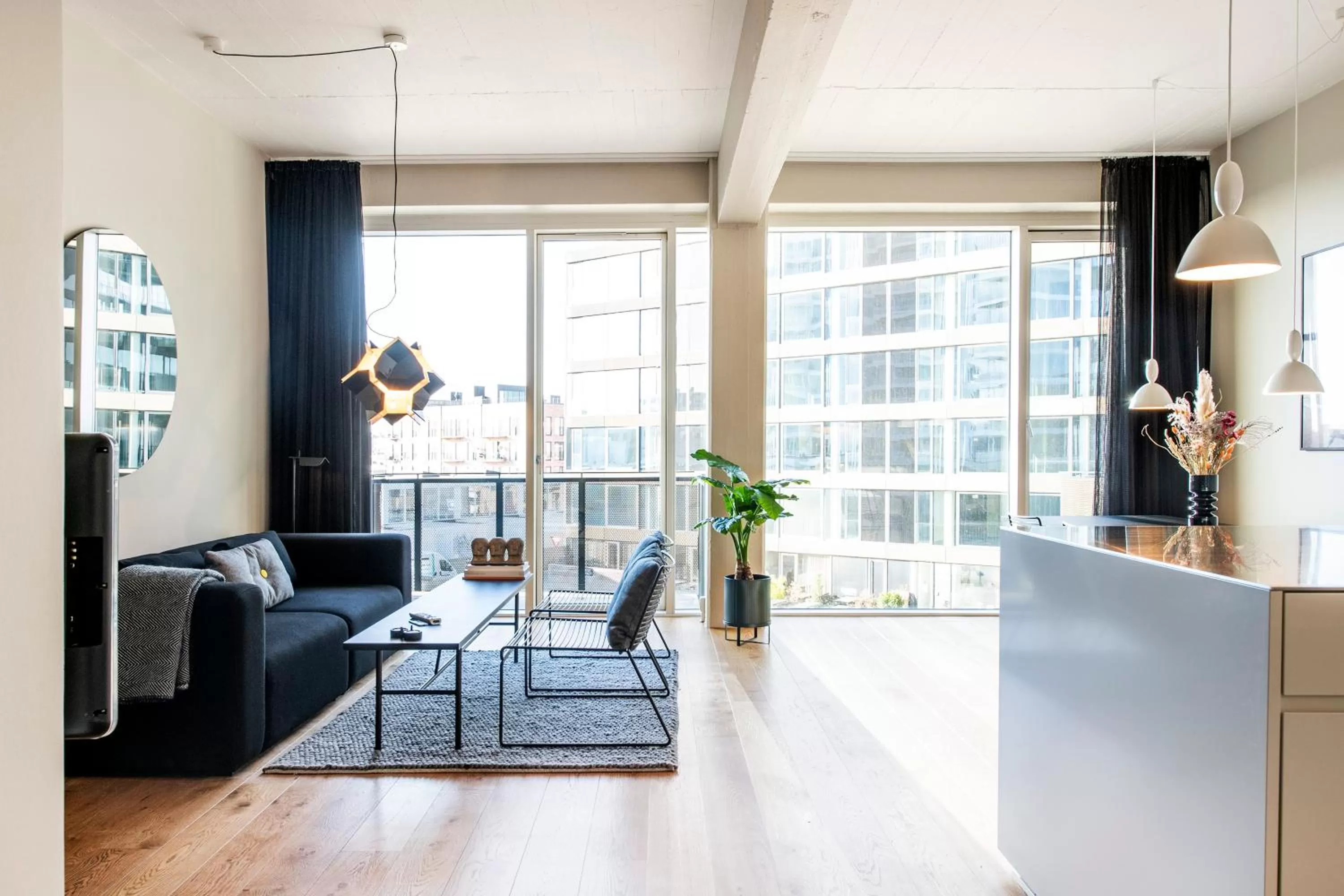 Living room, Seating Area in By The Pier apartments - Into This Place