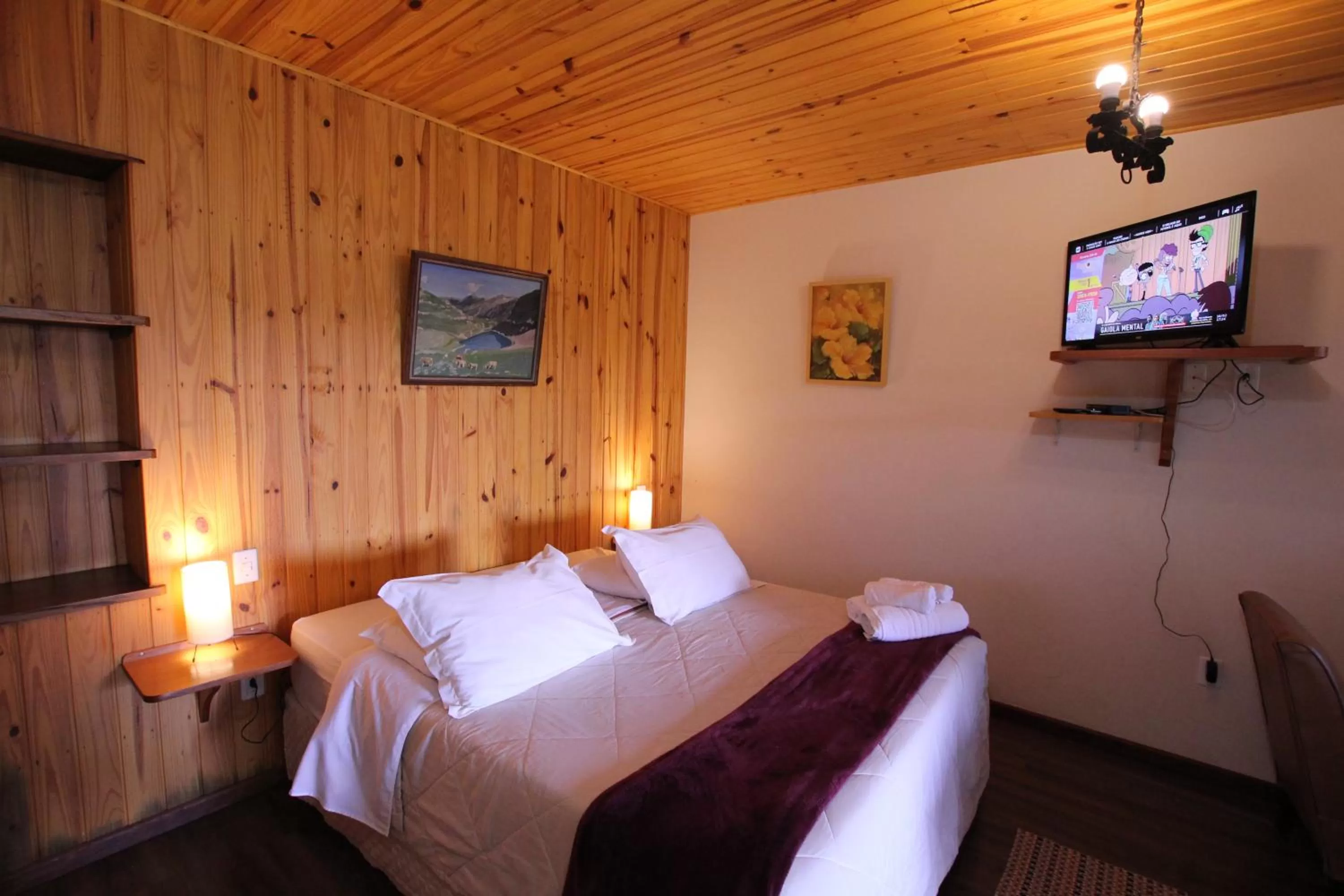 Bed in Pousada Aguia da Montanha