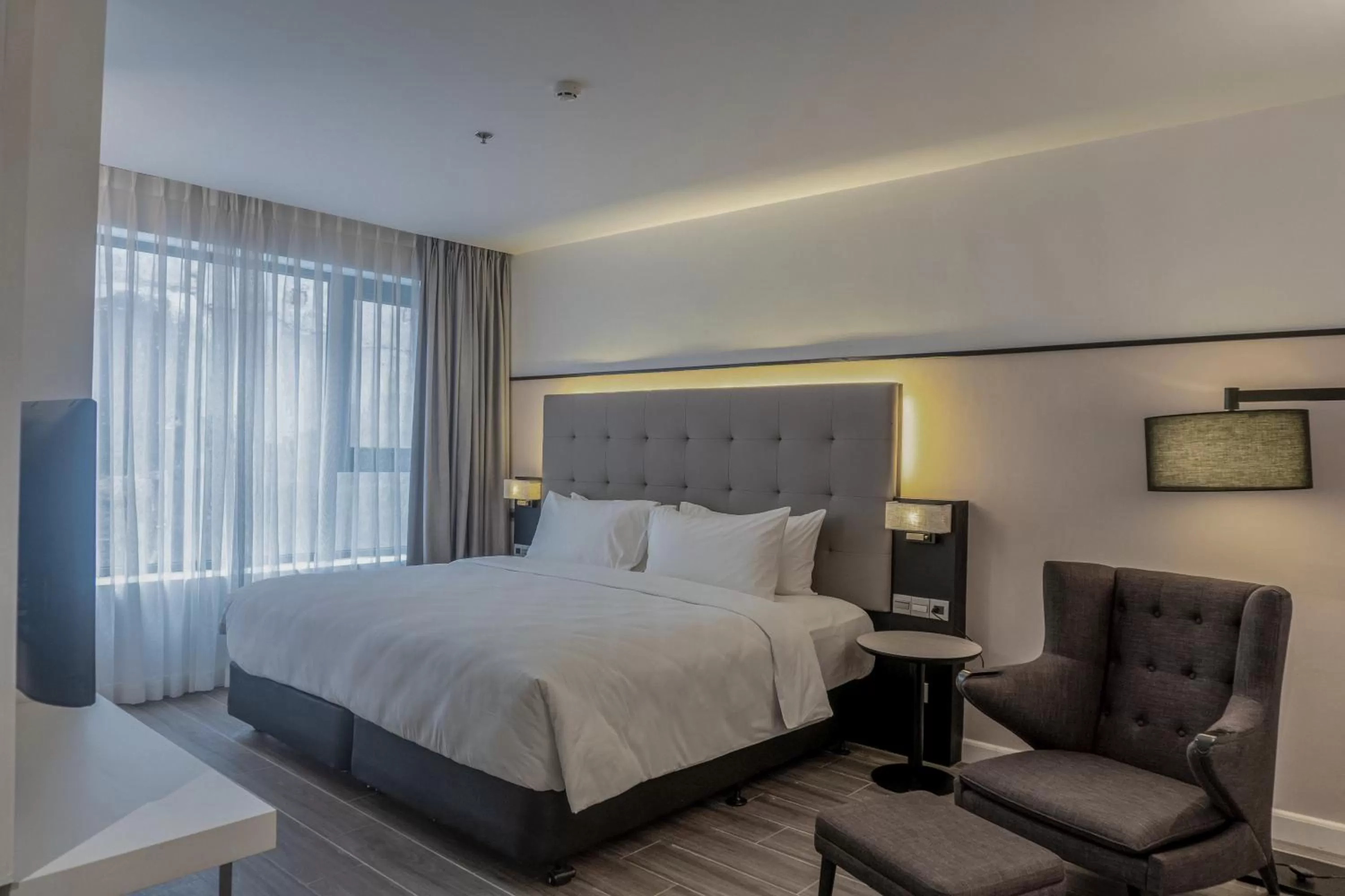 Bed in M Village Hotel Tôn Thất Đạm