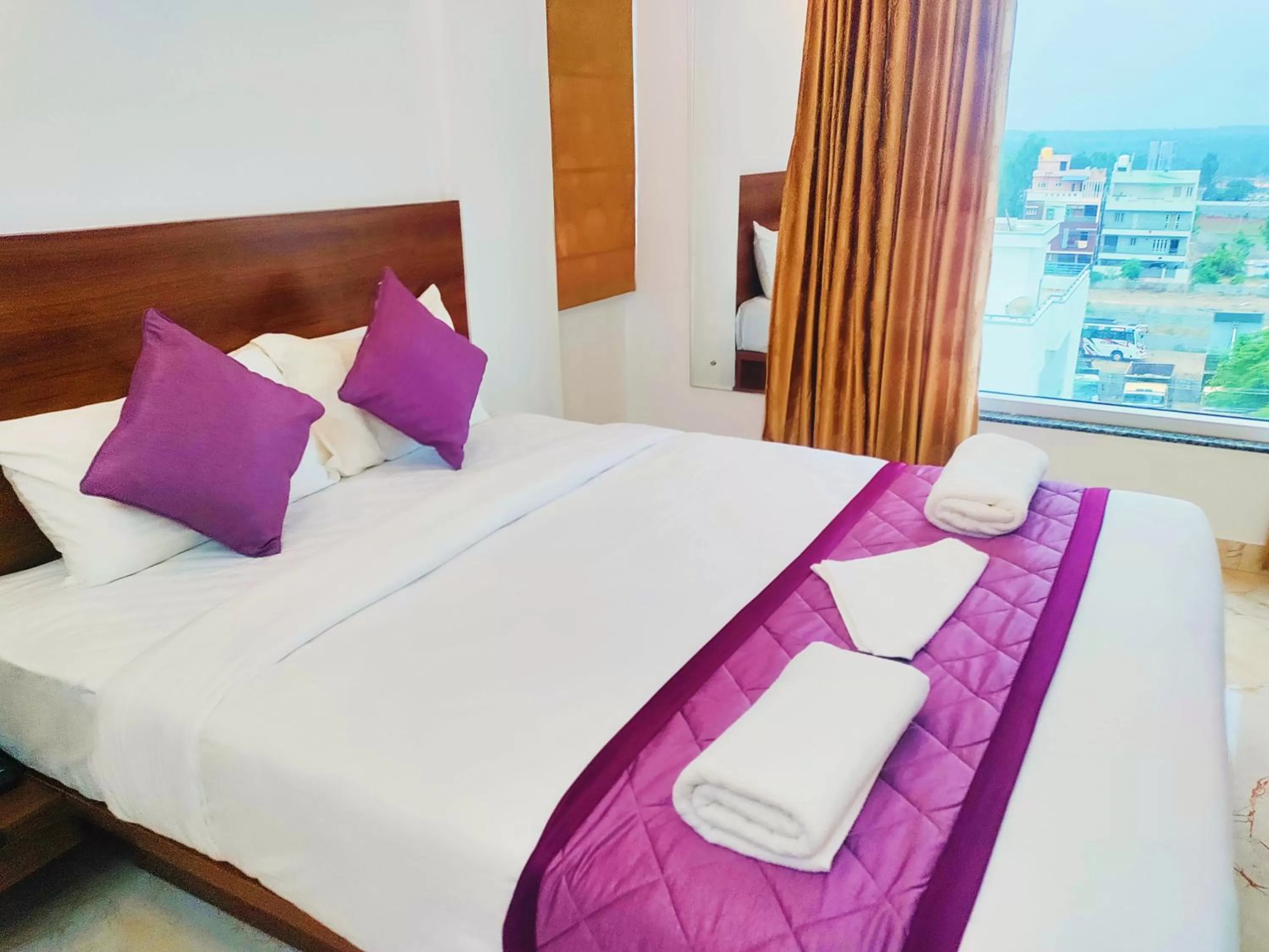 Bedroom, Bed in Keerthis Royal Suites - Hotel Near Kempegowda International Airport
