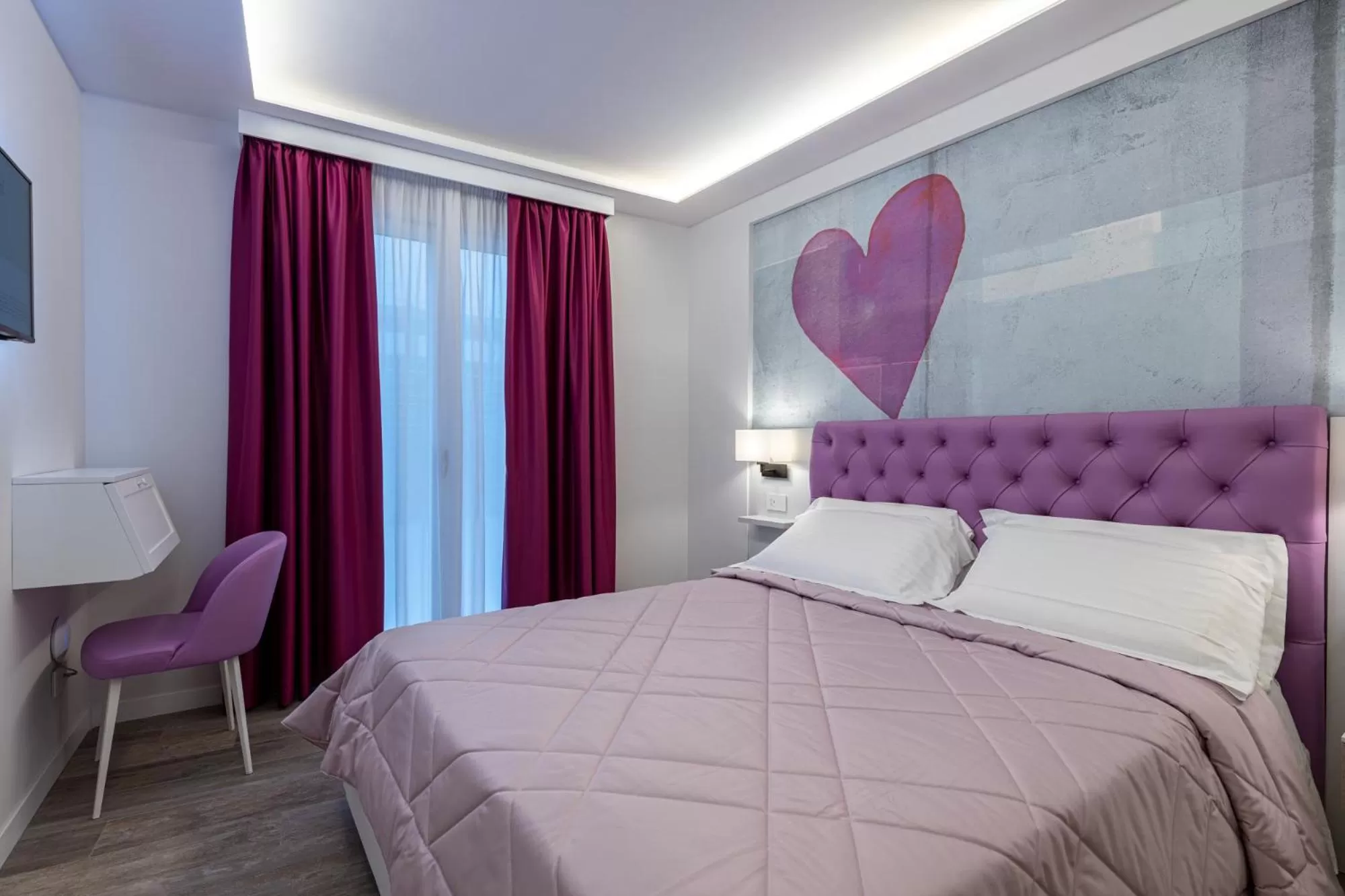 Photo of the whole room, Bed in Petit Hotel