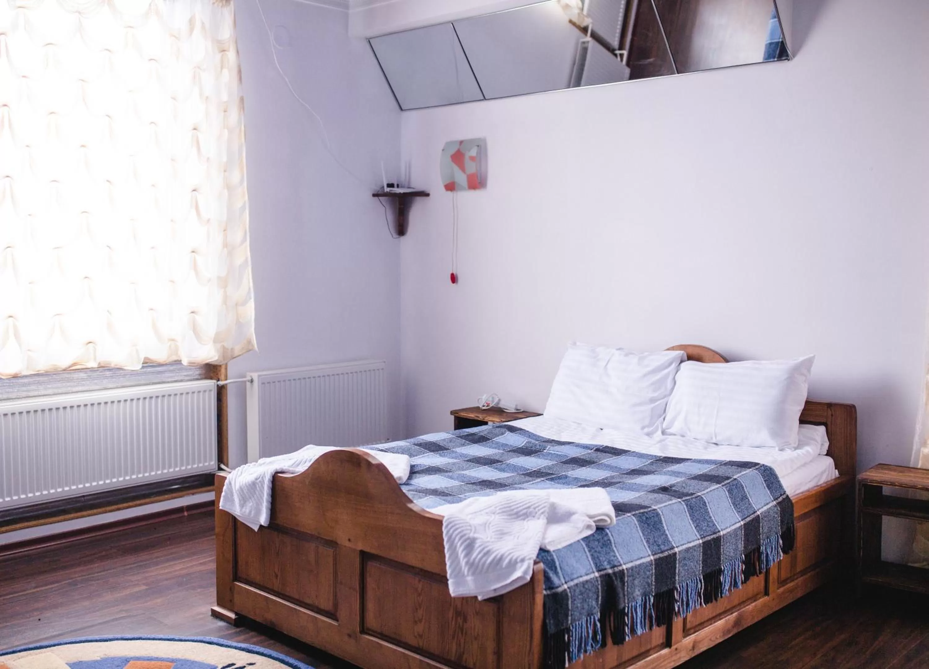 Quadruple Room with Balcony in Kolyba Opryshkiv