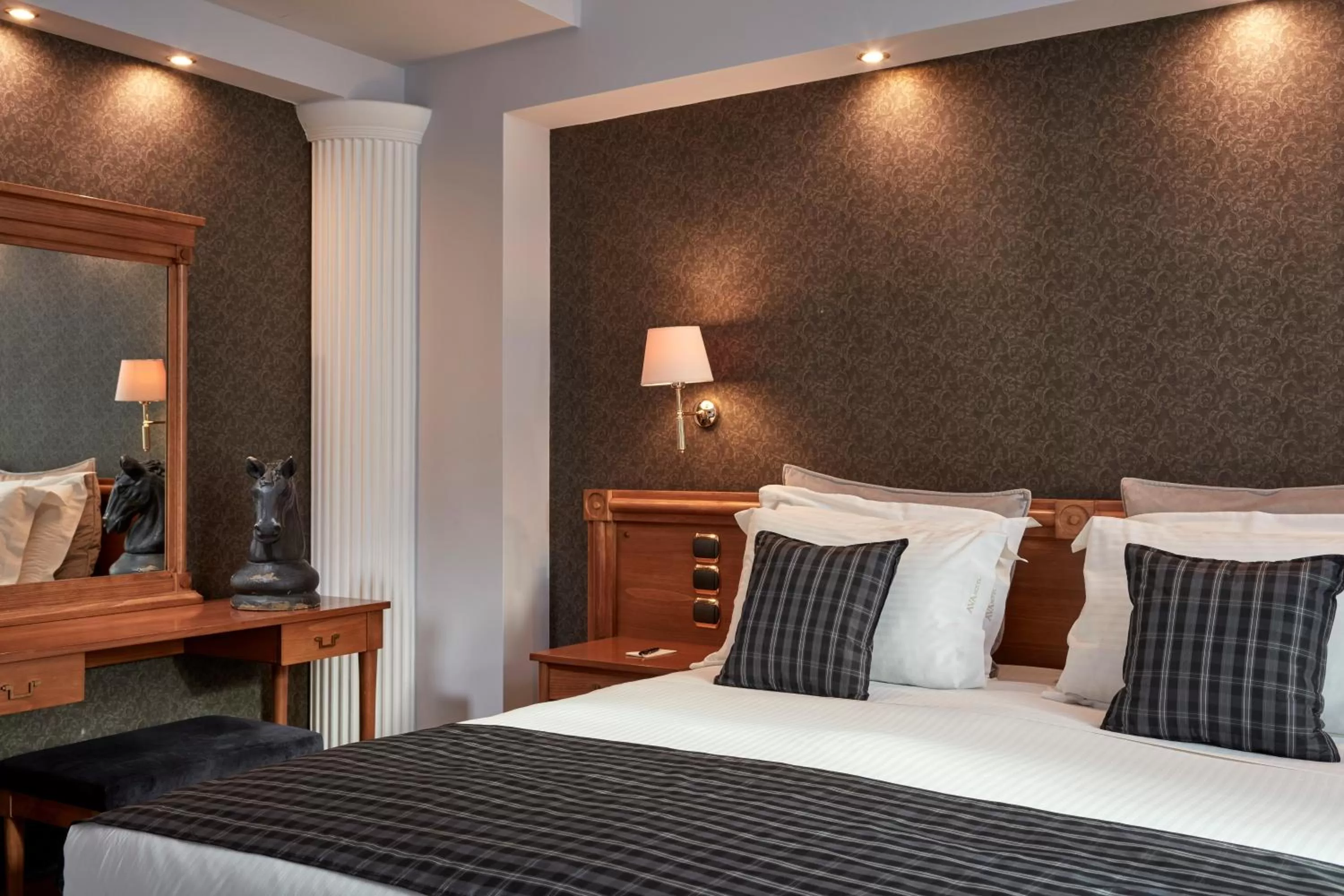 Bed in Ava Hotel and Suites