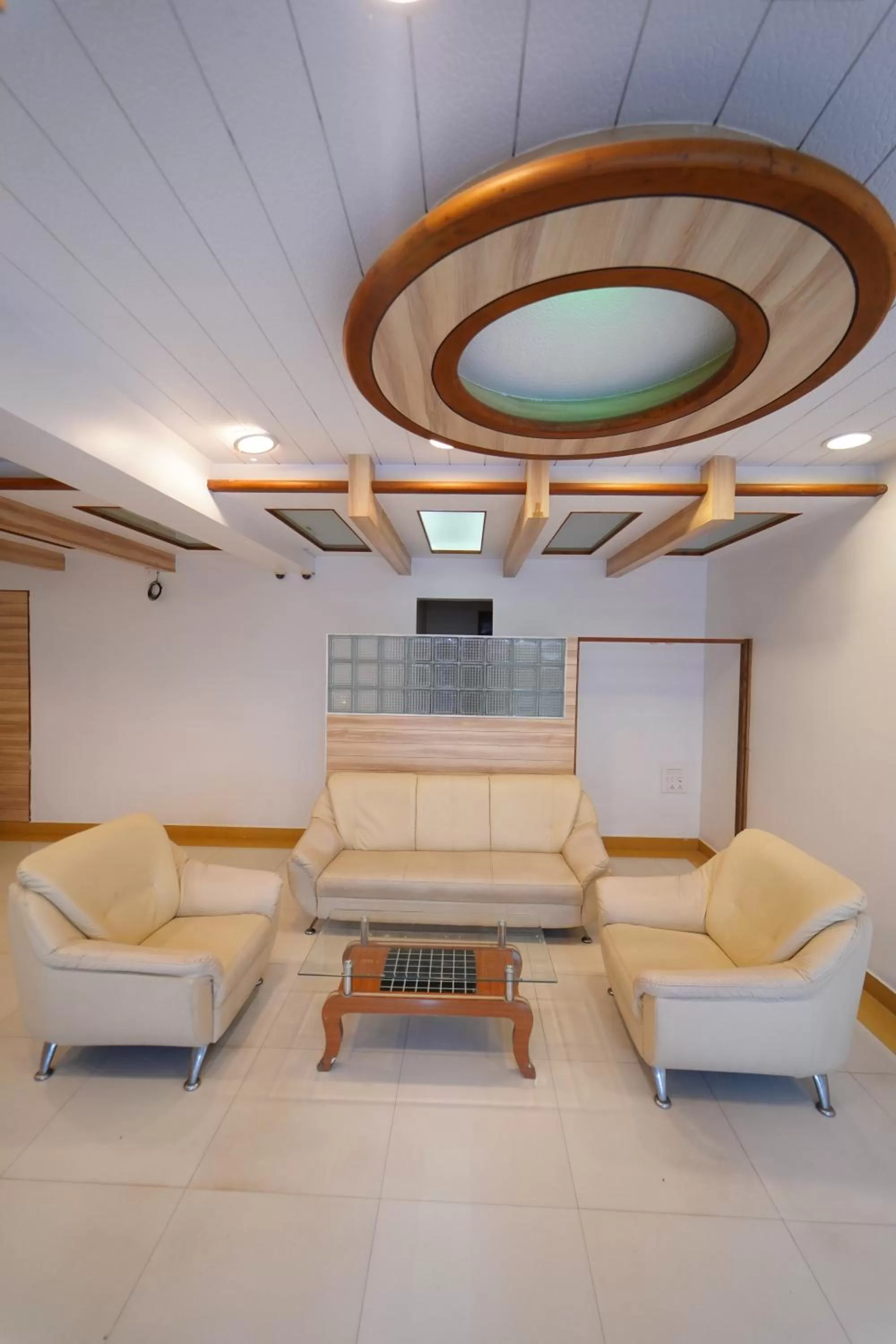 Seating area in Hotel Palmyra Grand Inn