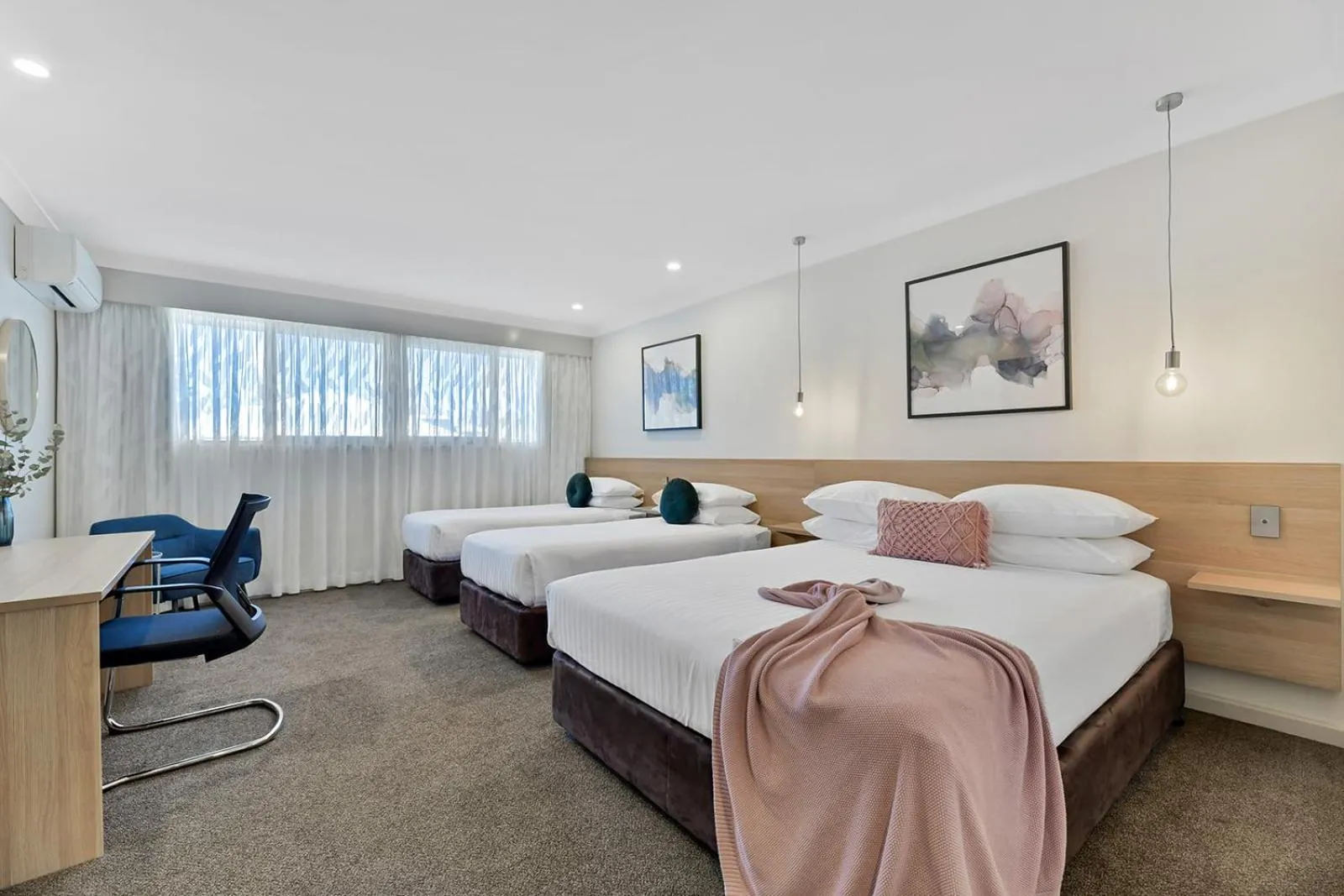 Bed in Central Caleula Motor Lodge