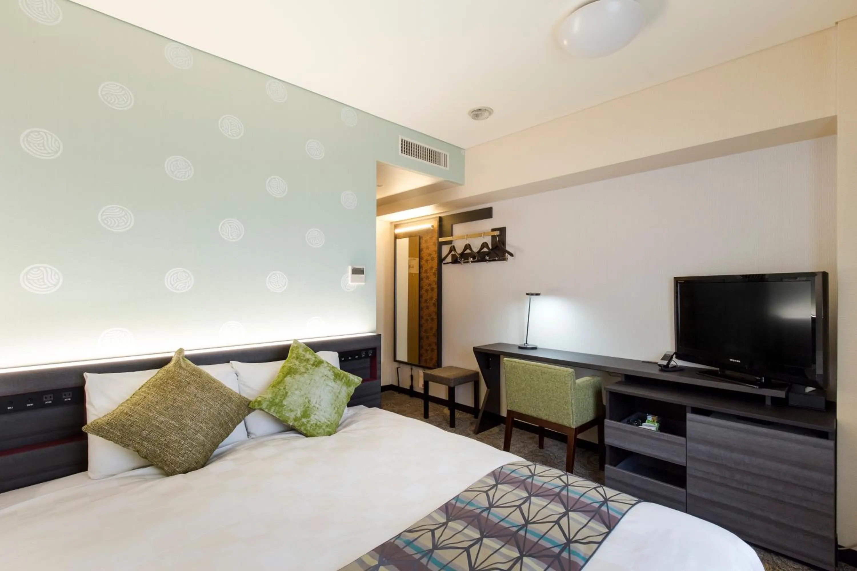 Decorative detail, Bed in Takamatsu Tokyu REI Hotel