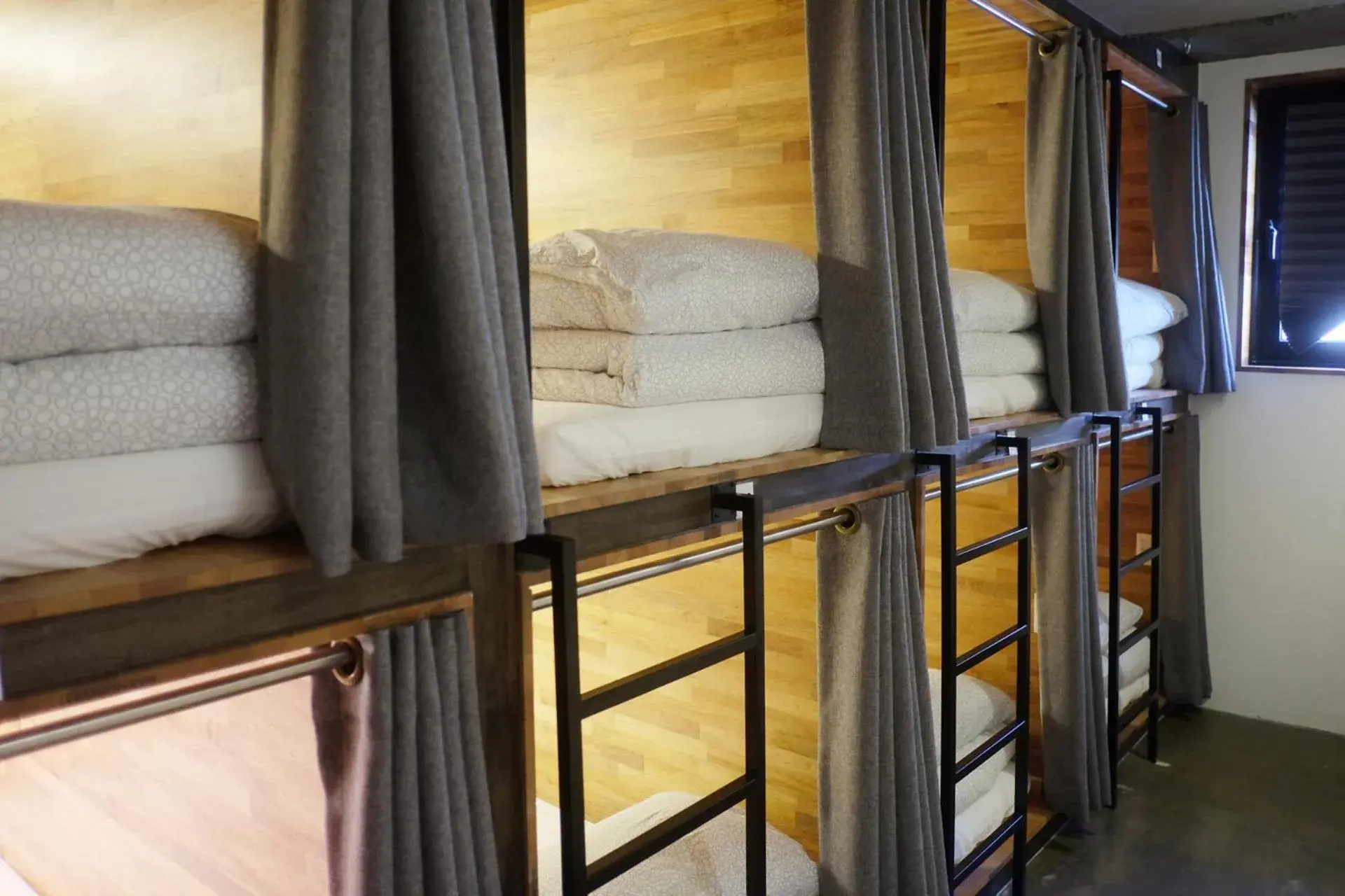 Bed in Male Dormitory Room in The Cube Hotel Bed in Male Dormitory Room in The Cube Hotel