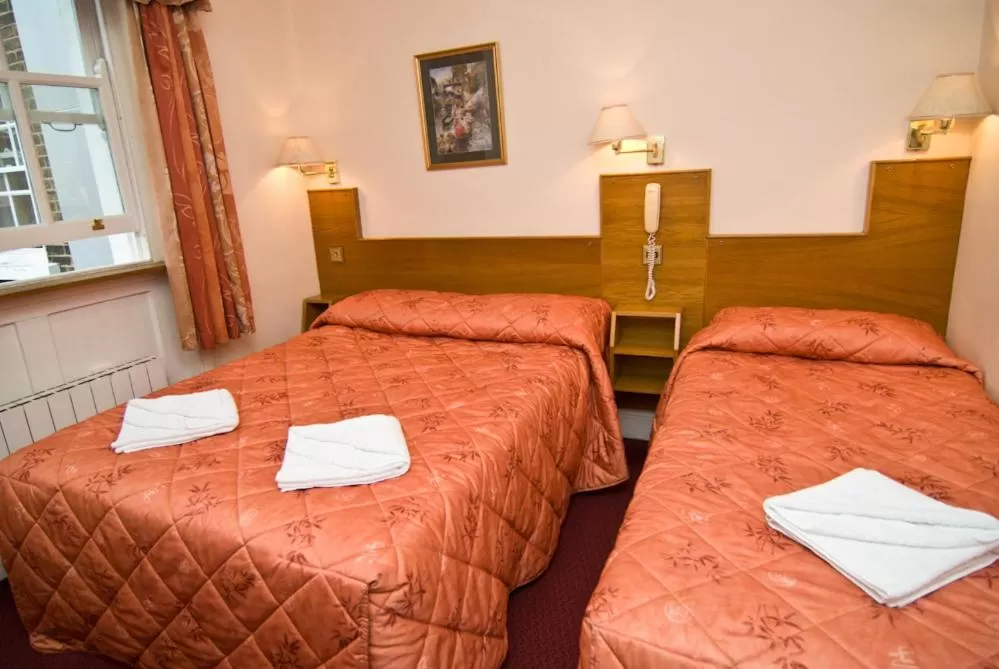 Bed in Alexandra Hotel