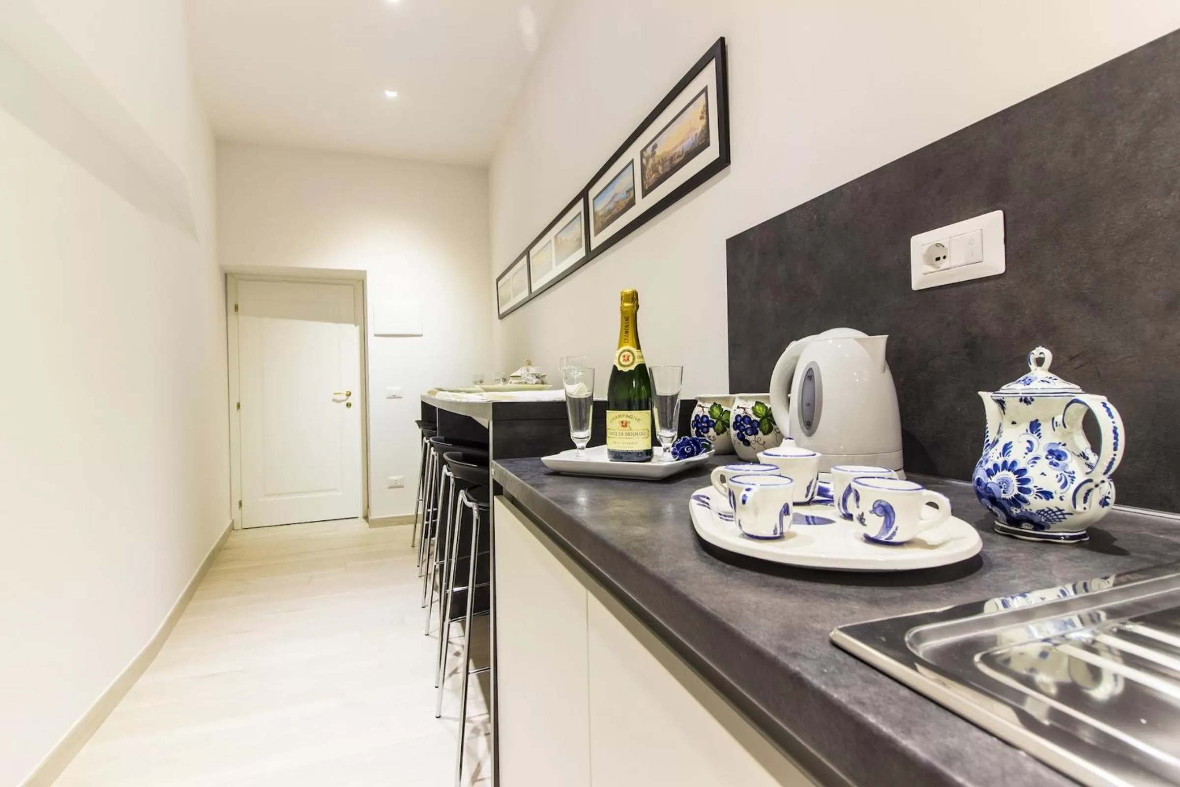 Kitchen or kitchenette in Palazzo d'Auria ApartHotel