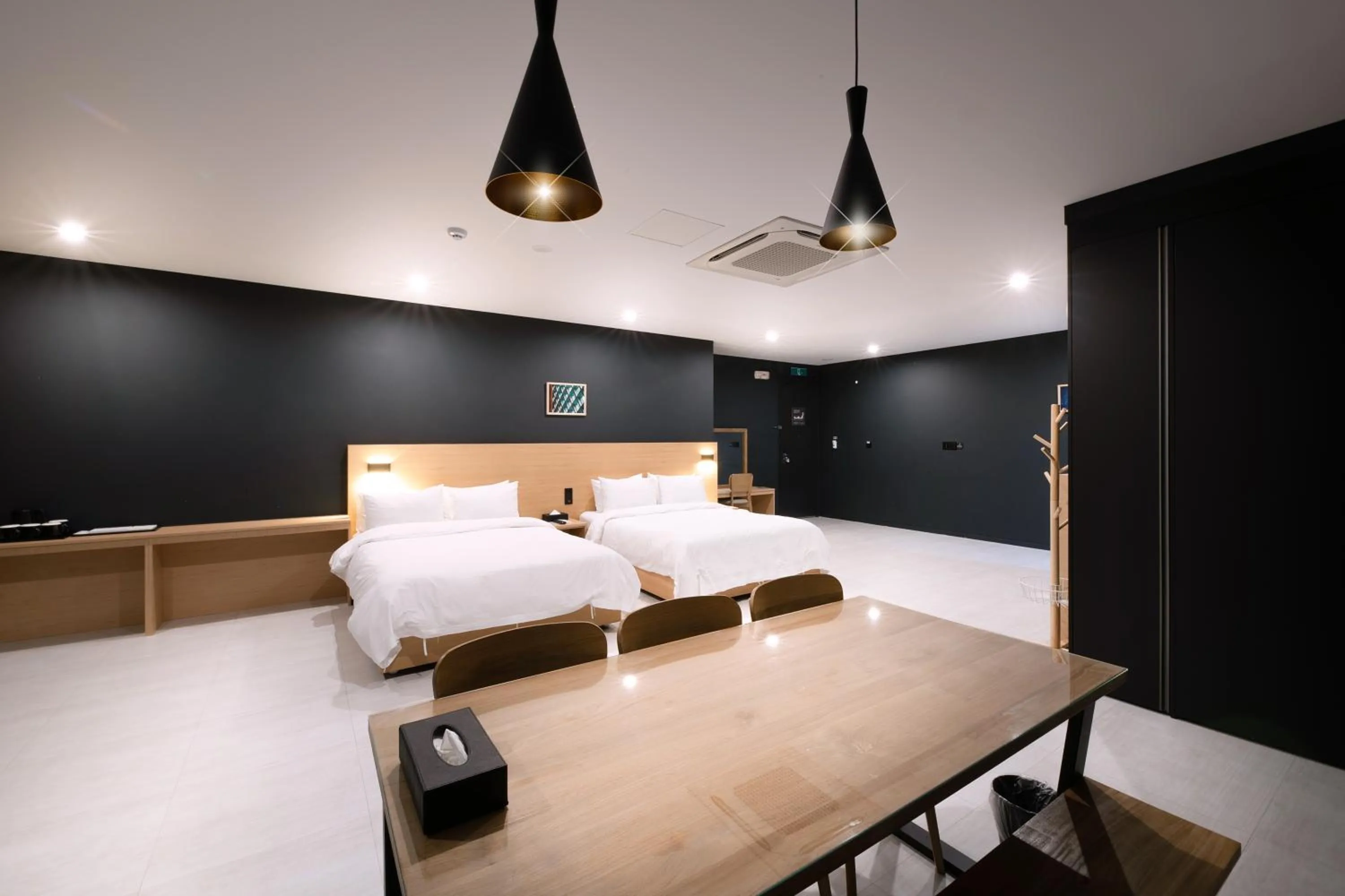 Bed in Mipo Oceanside Hotel