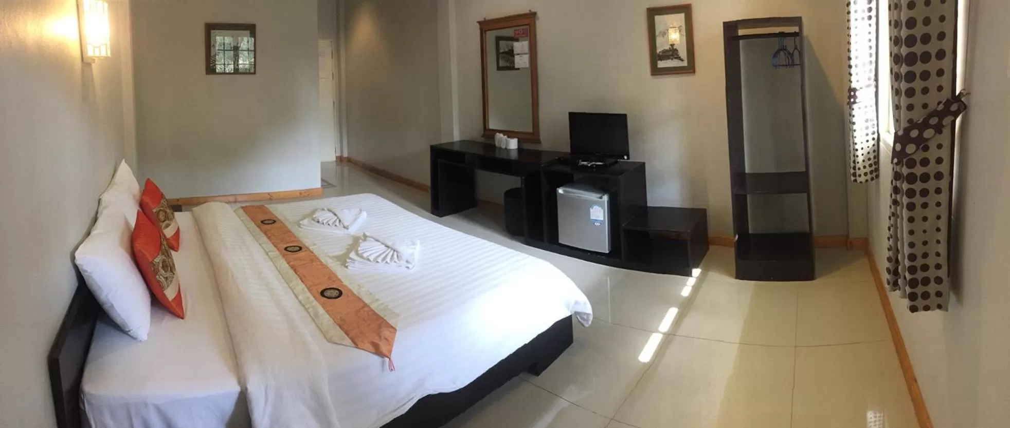 Bed in Bamboo House Resort