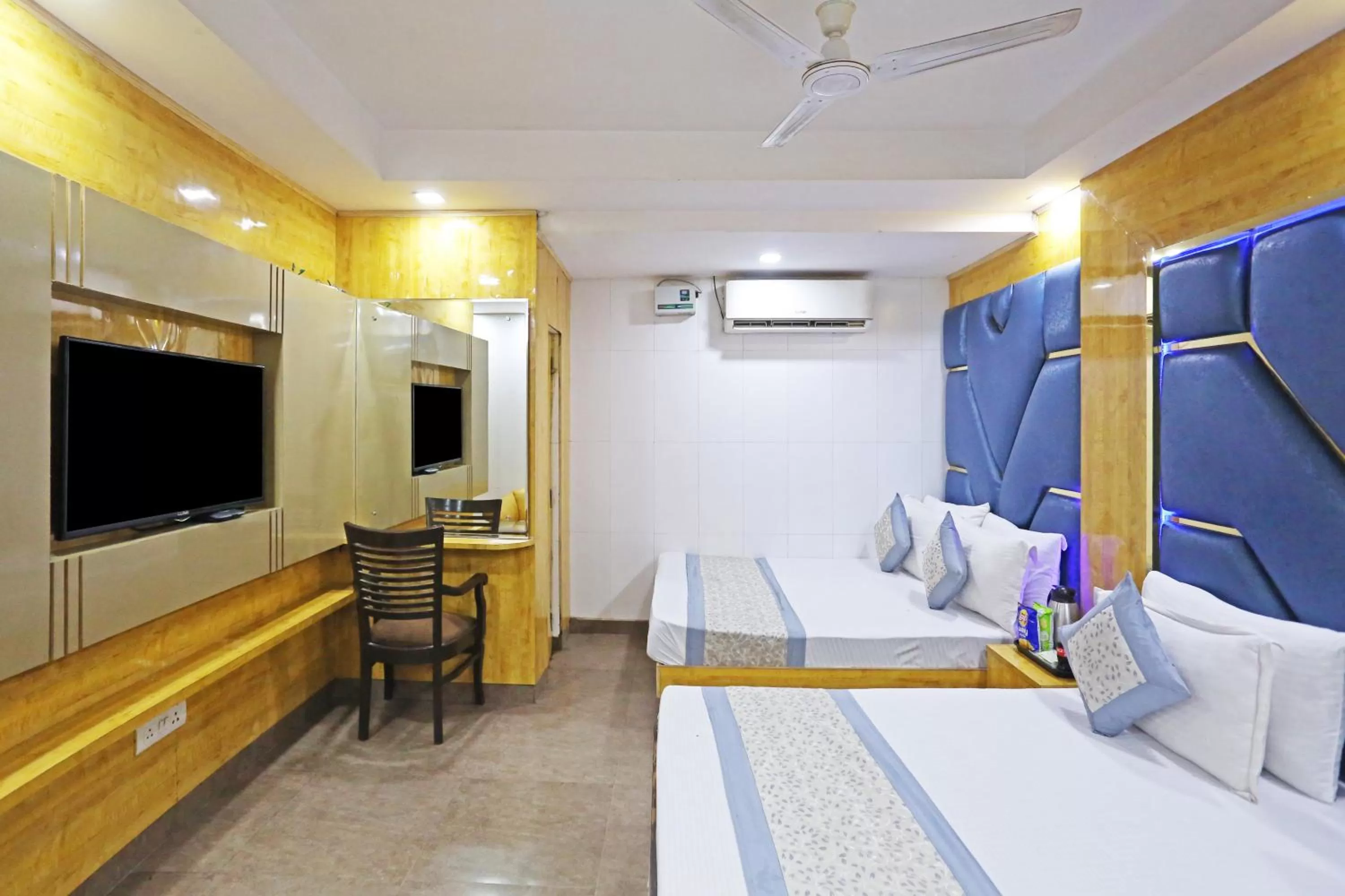 Photo of the whole room, TV/Entertainment Center in Hotel Preet Palace -5 Mints Walk From Nizamuddin Railway Station