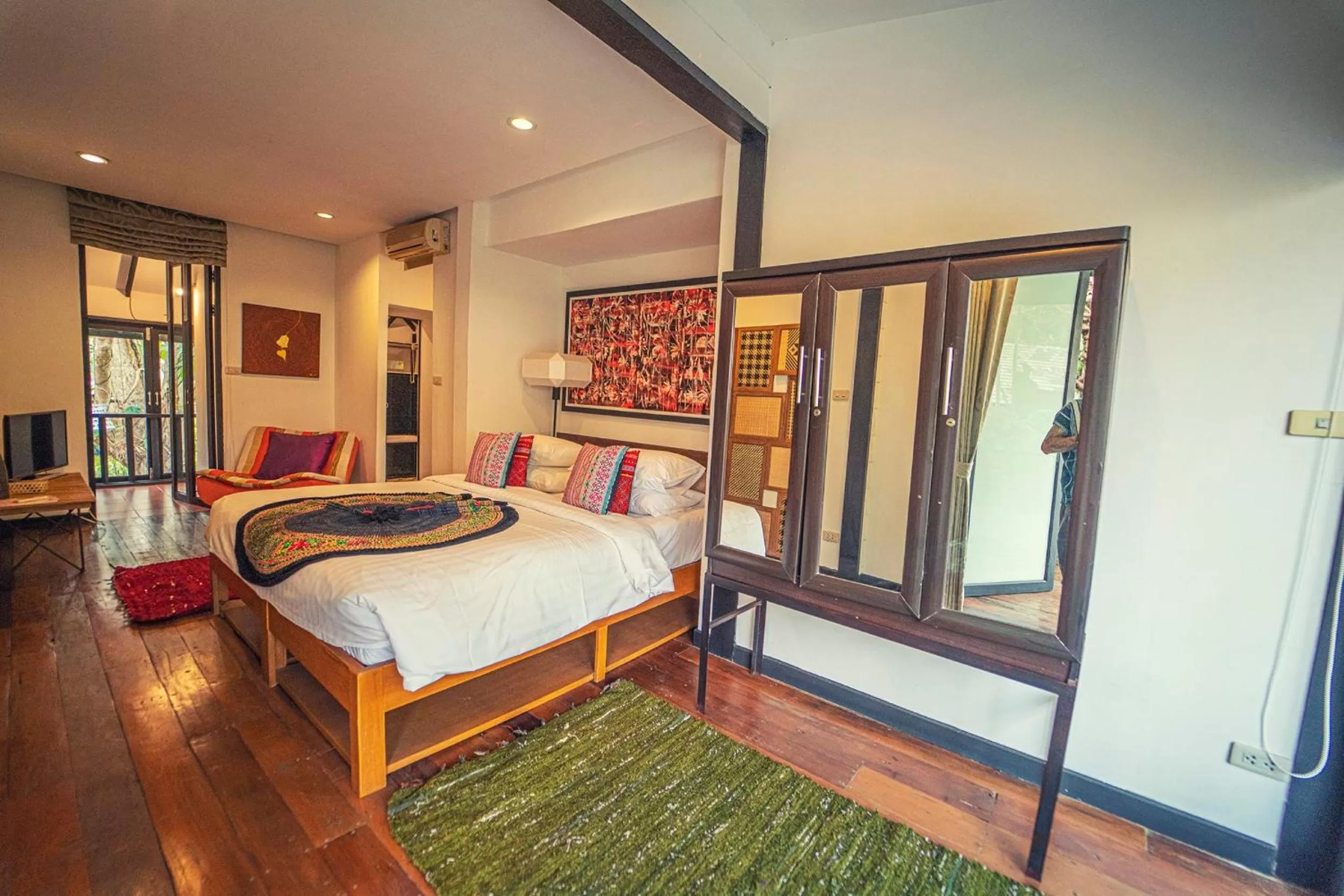 Photo of the whole room, Bed in Baan Suan Residence เฮือนพักบ้านสวน