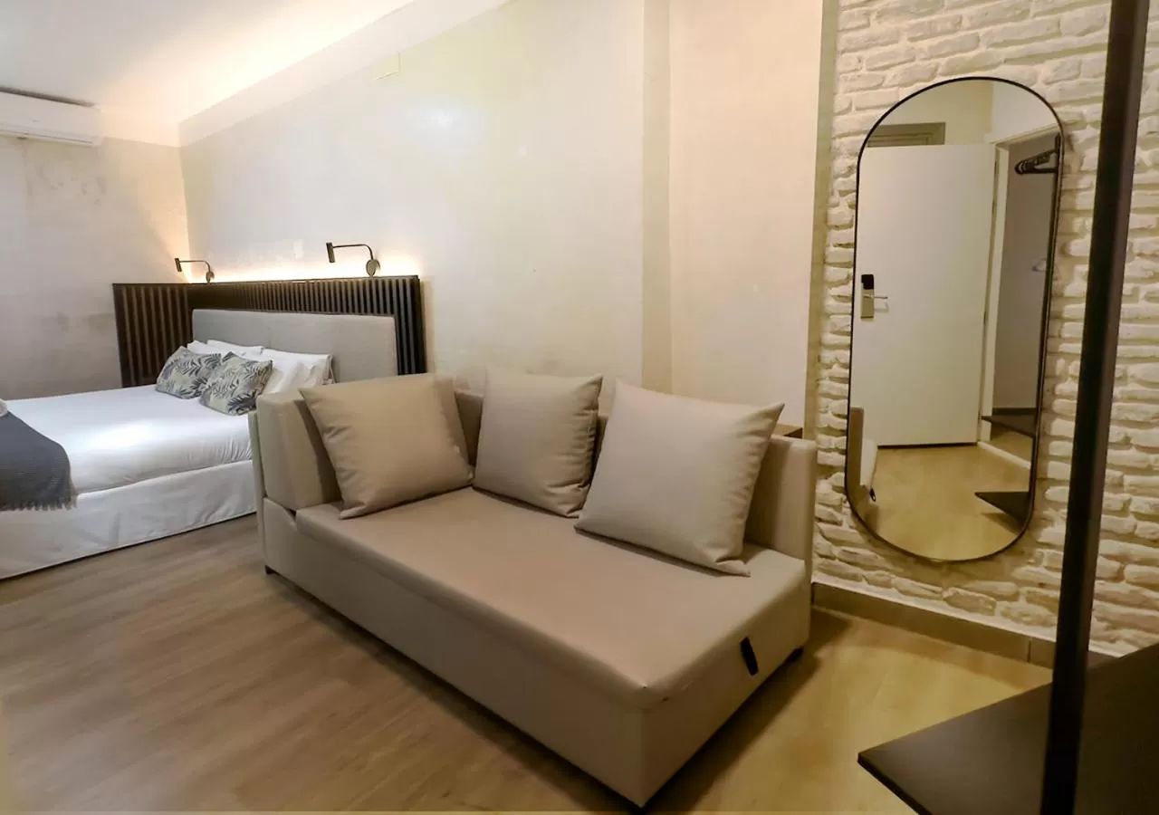 Photo of the whole room, Bed in ISA Sevilla Suites