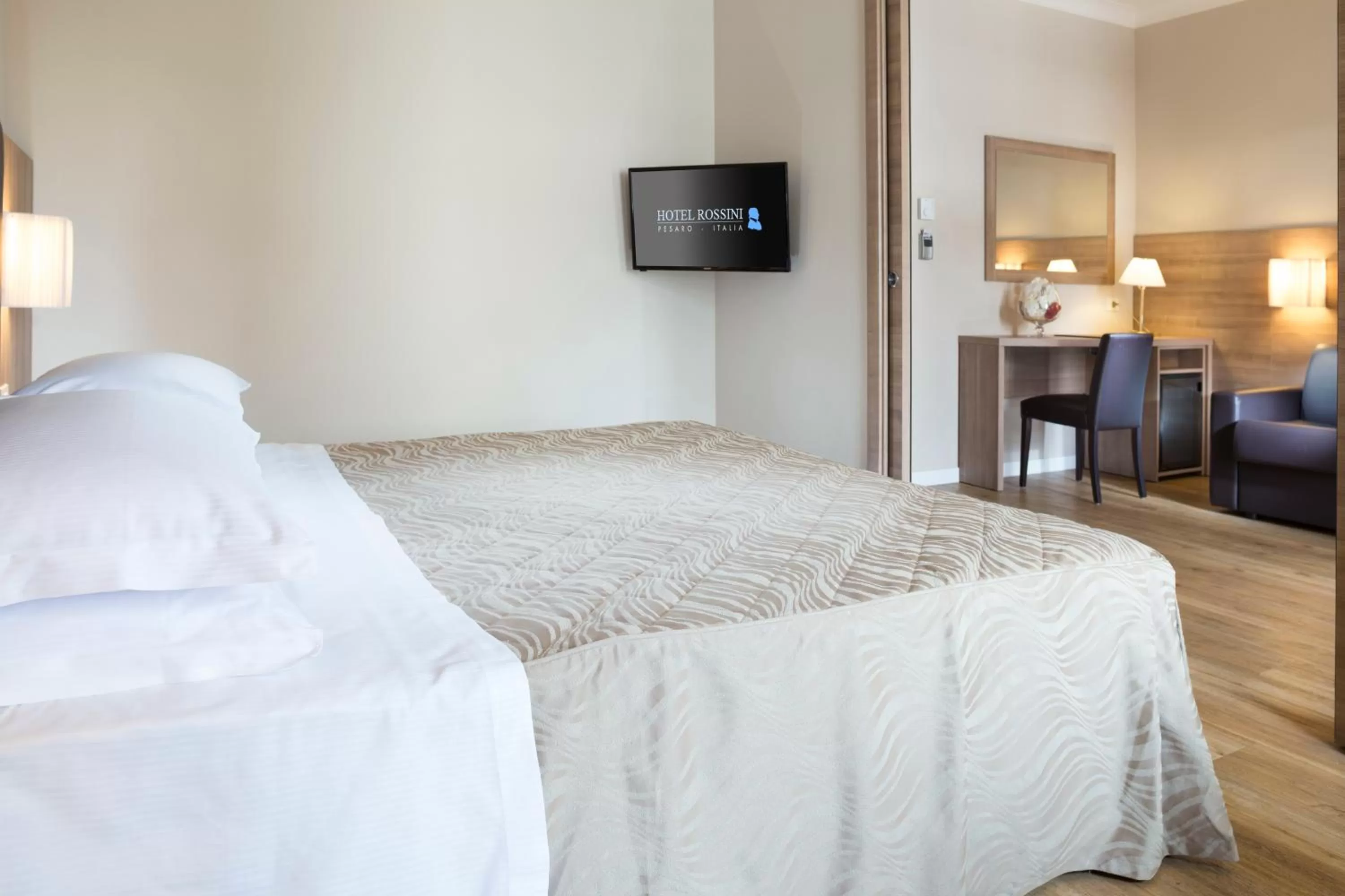 Bed in Hotel Rossini