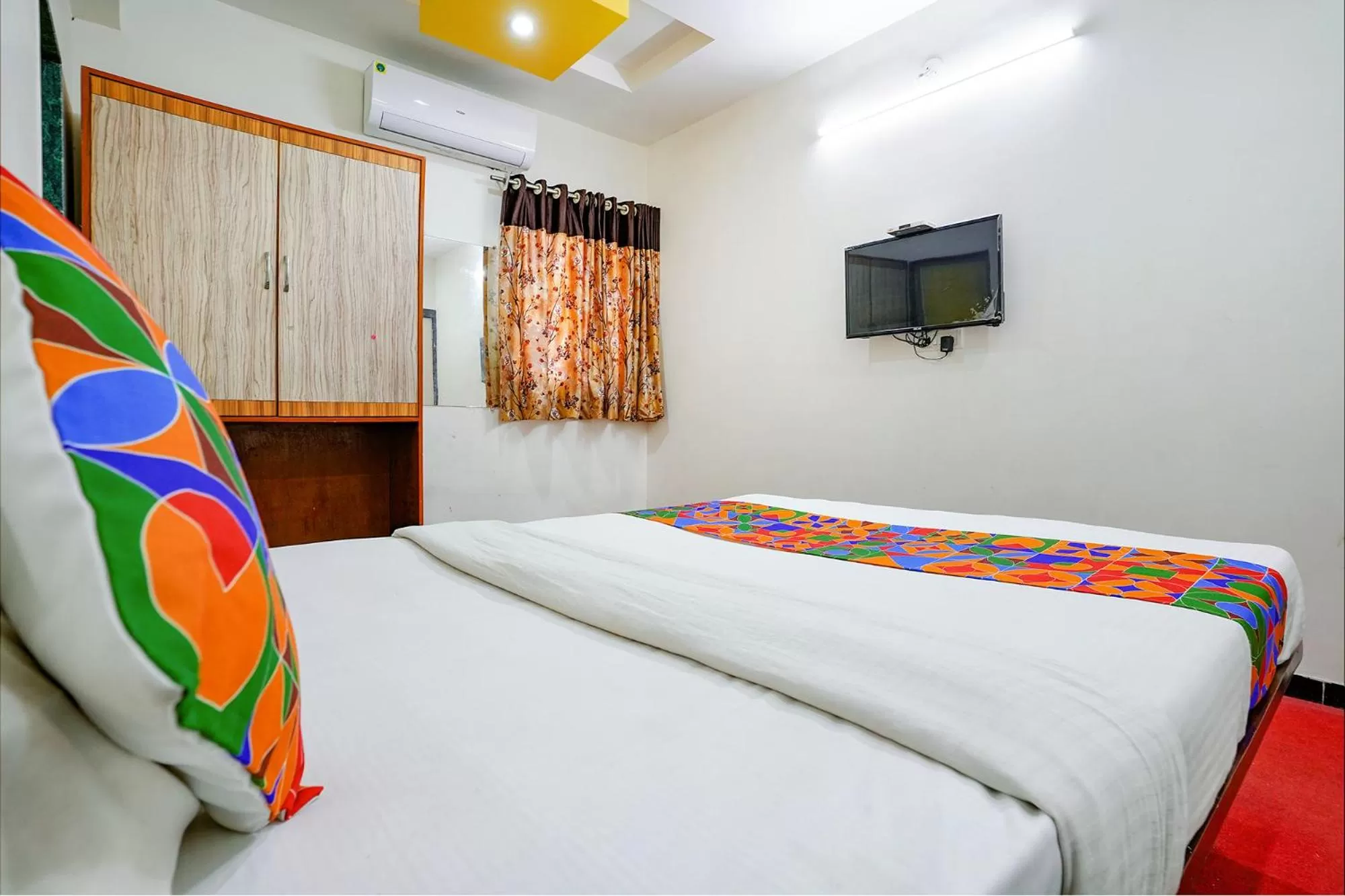 Bed in FabHotel Sai Chatra