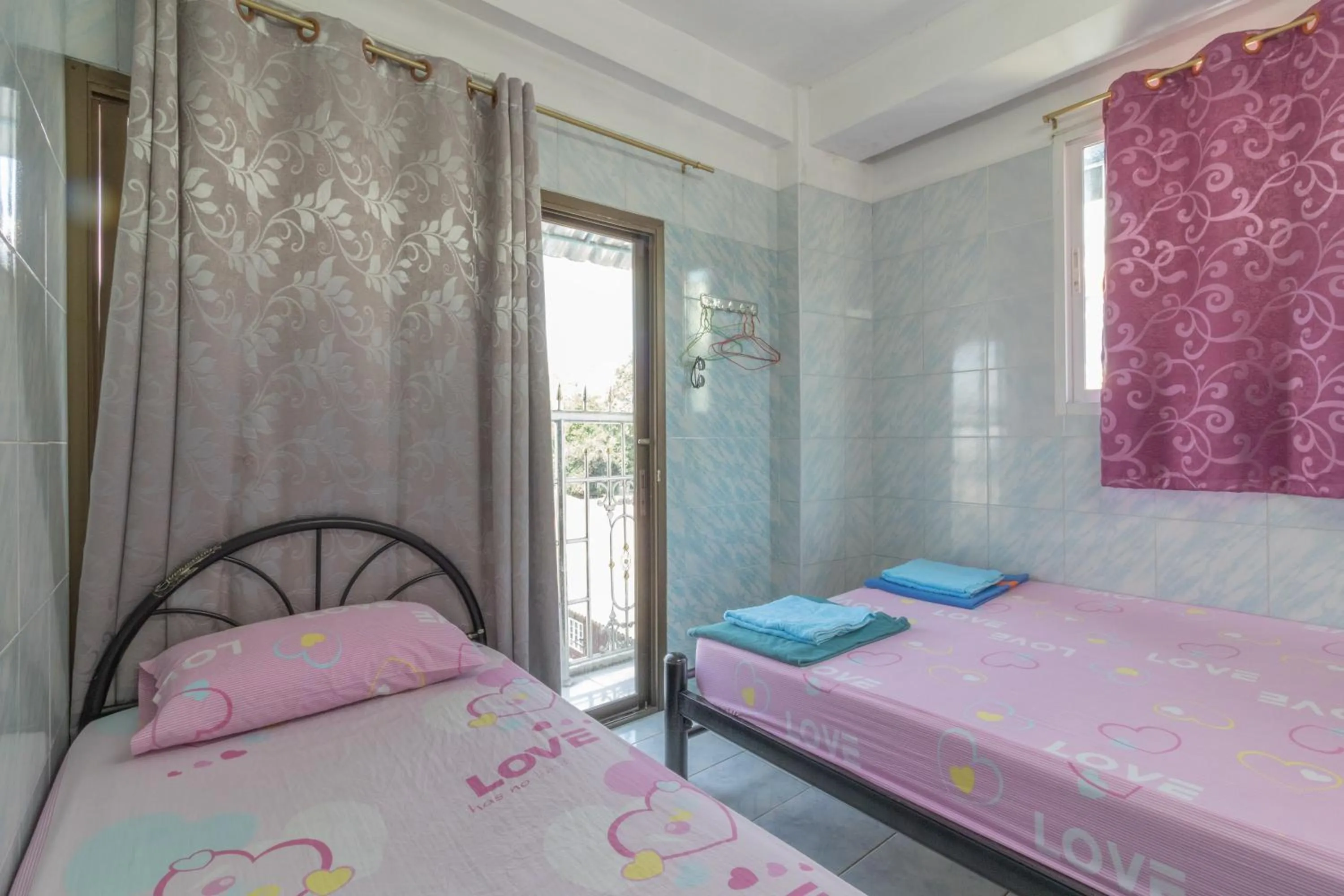 Bed in New Central Guesthouse