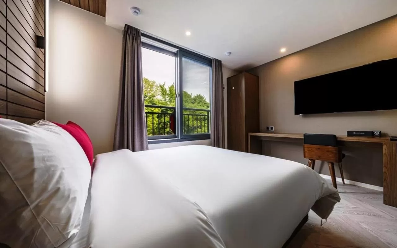 Bed in Maron Hotel Nampo