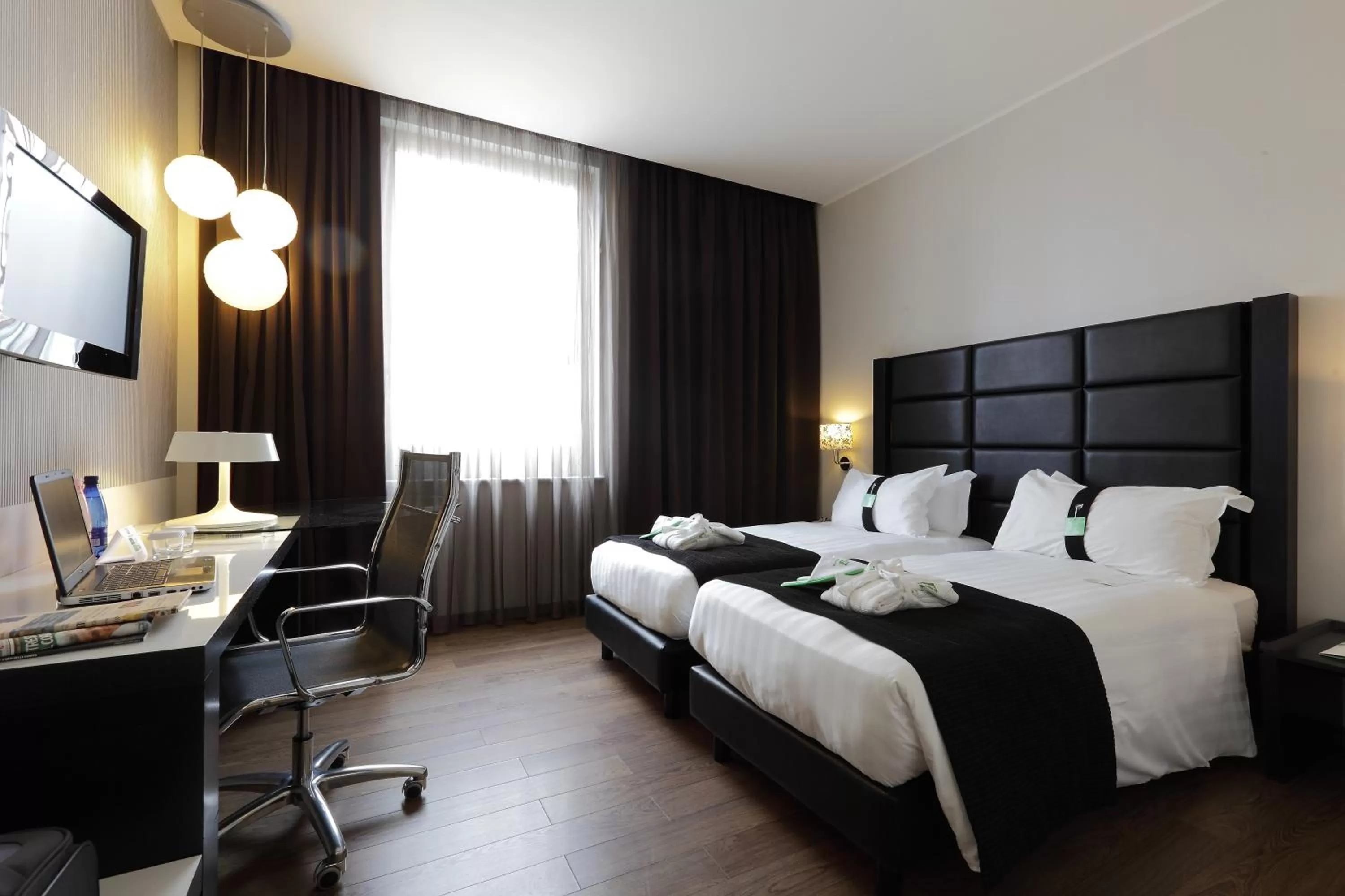 Photo of the whole room, Bed in Holiday Inn Genoa City by IHG