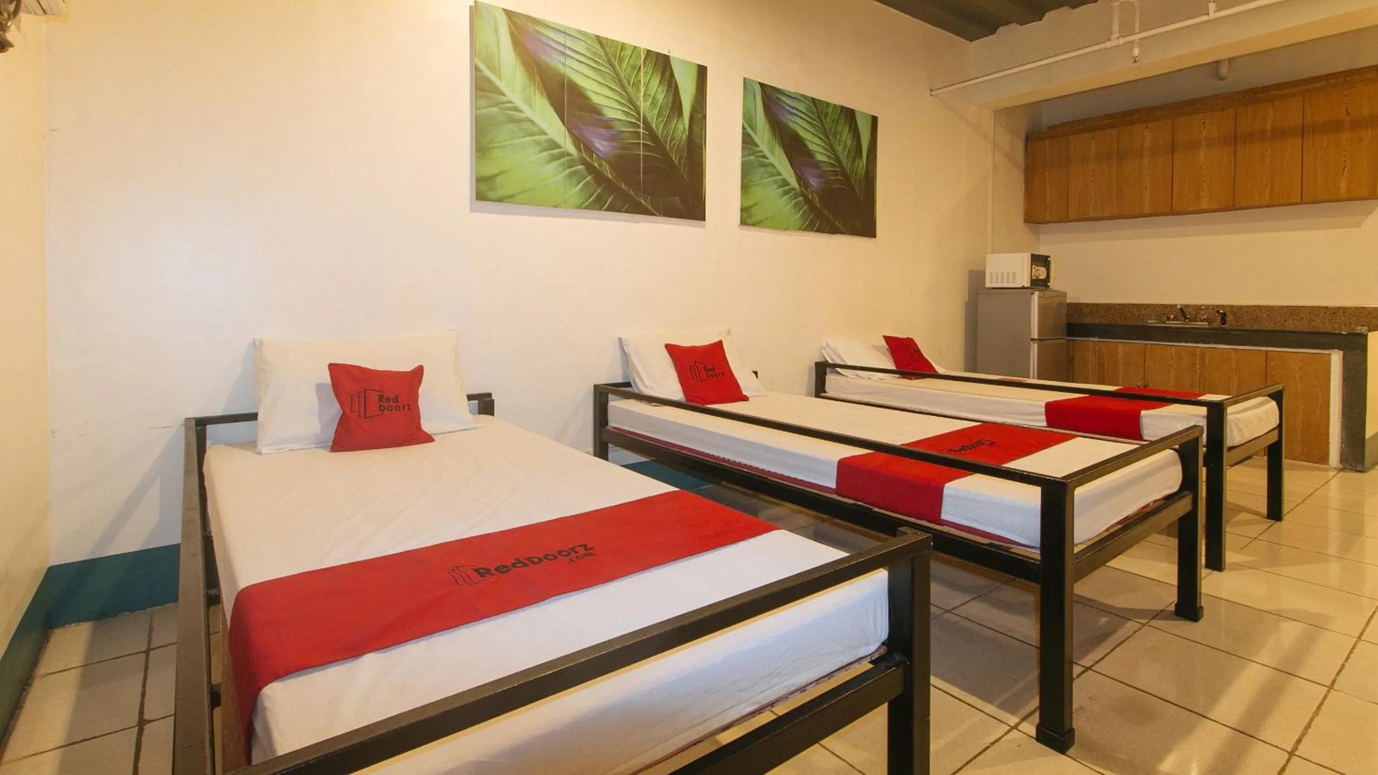 Bedroom, Bed in RedDoorz at Crowne One Condo