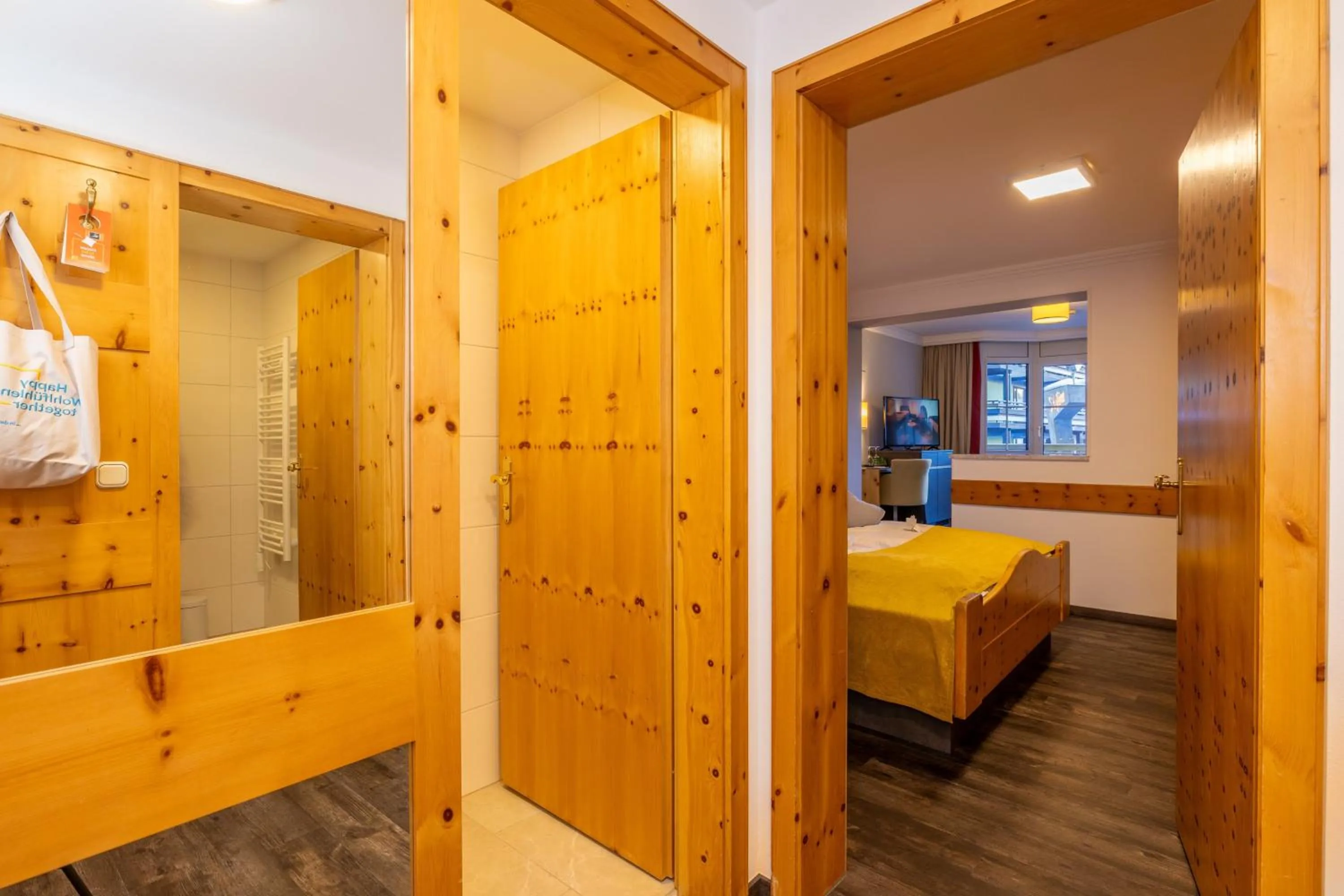 Photo of the whole room, Bed in JUFA Alpenhotel Saalbach