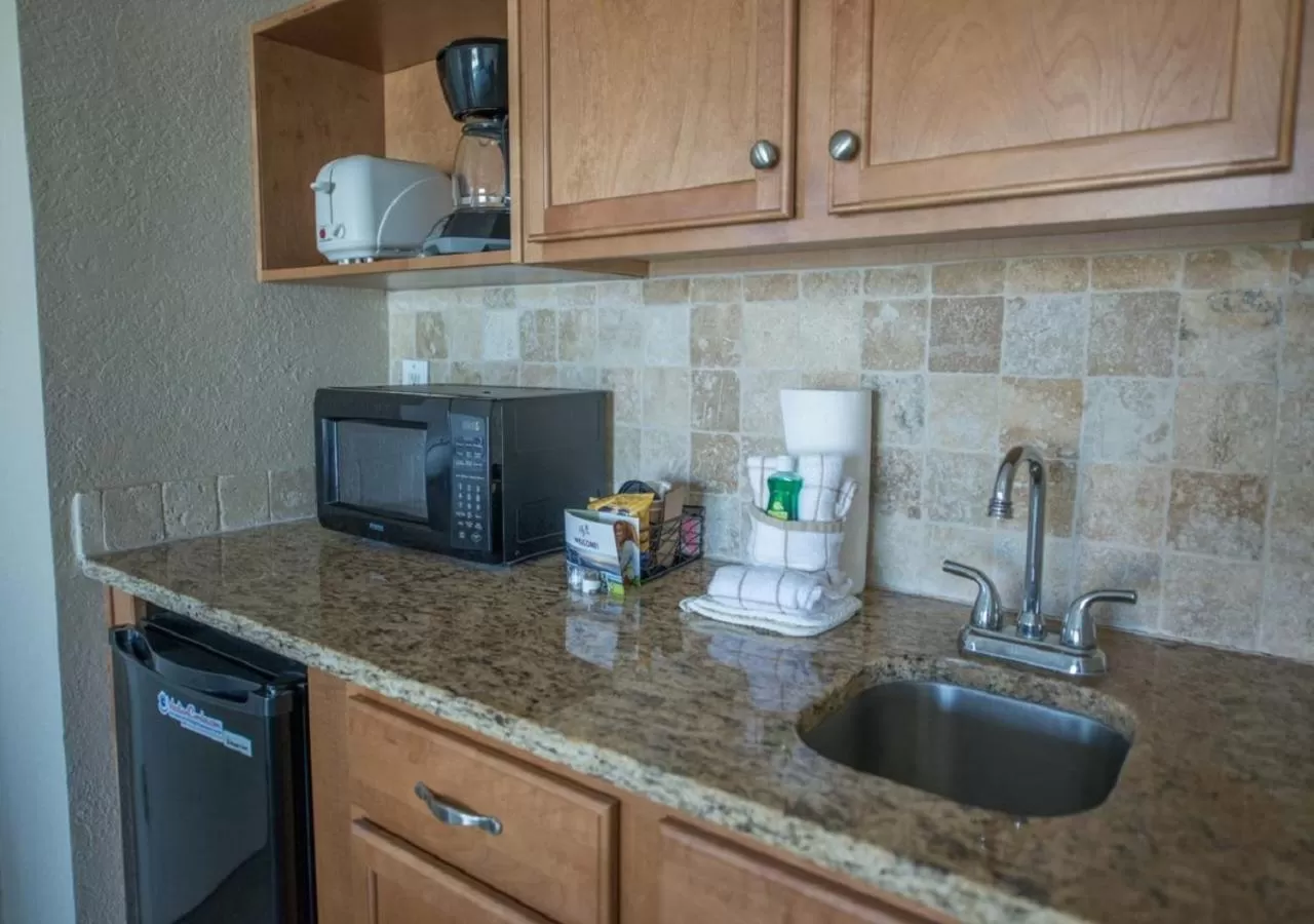 Kitchen or kitchenette in Coconut Palms Beach Resort II