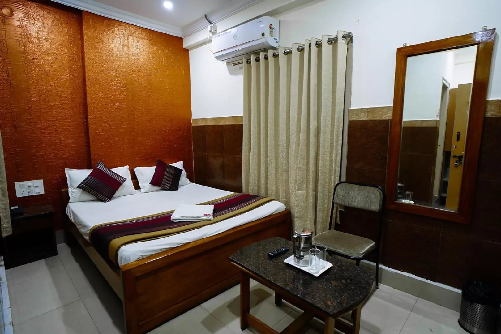 Bed in HOTEL PRAKAASH RESIDENCY