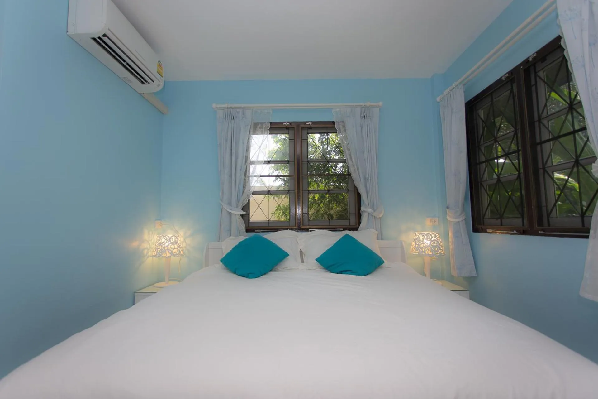 Bed in Thararin Villa