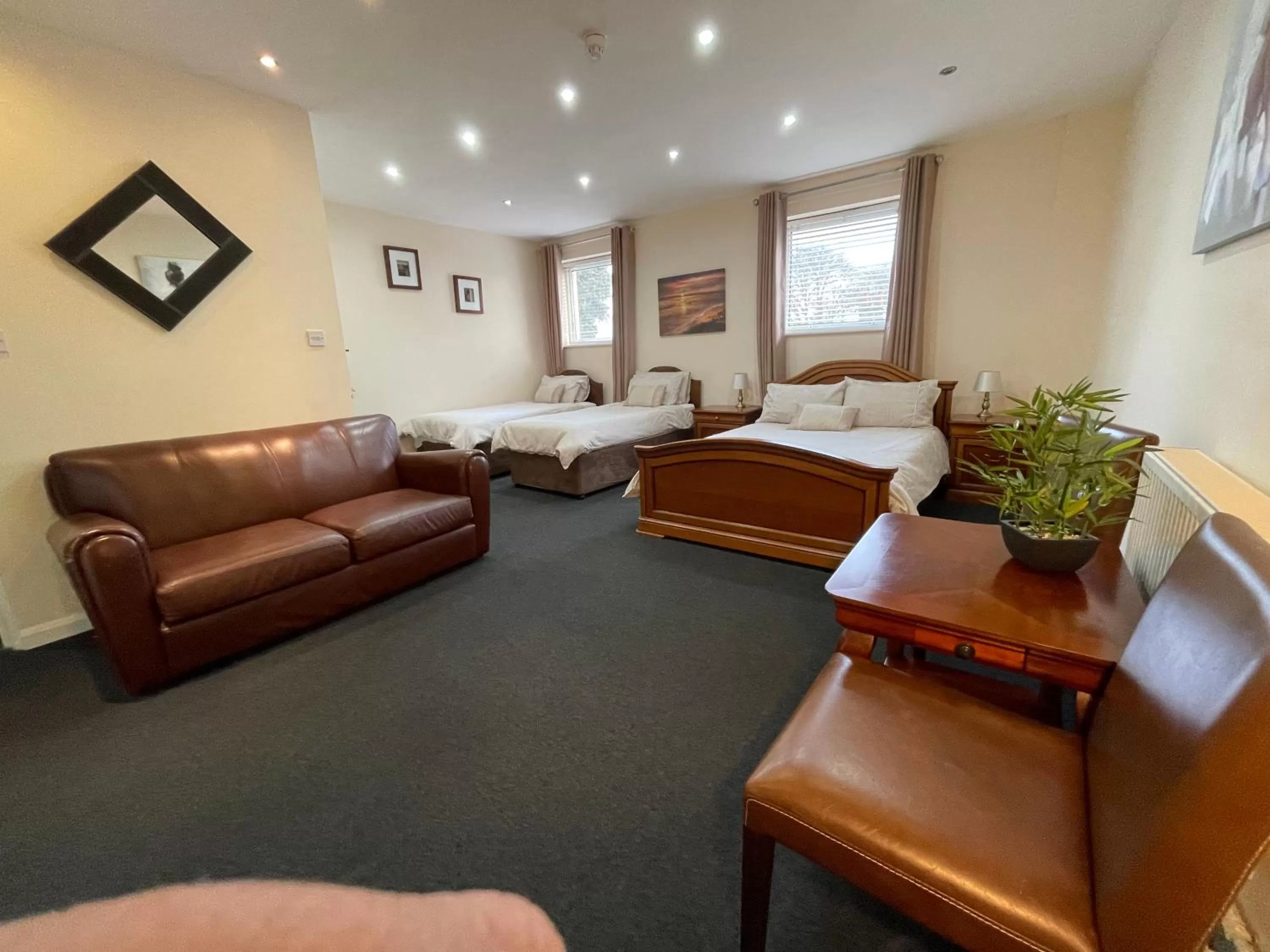 Bed, Seating Area in The Goodlife Guesthouse