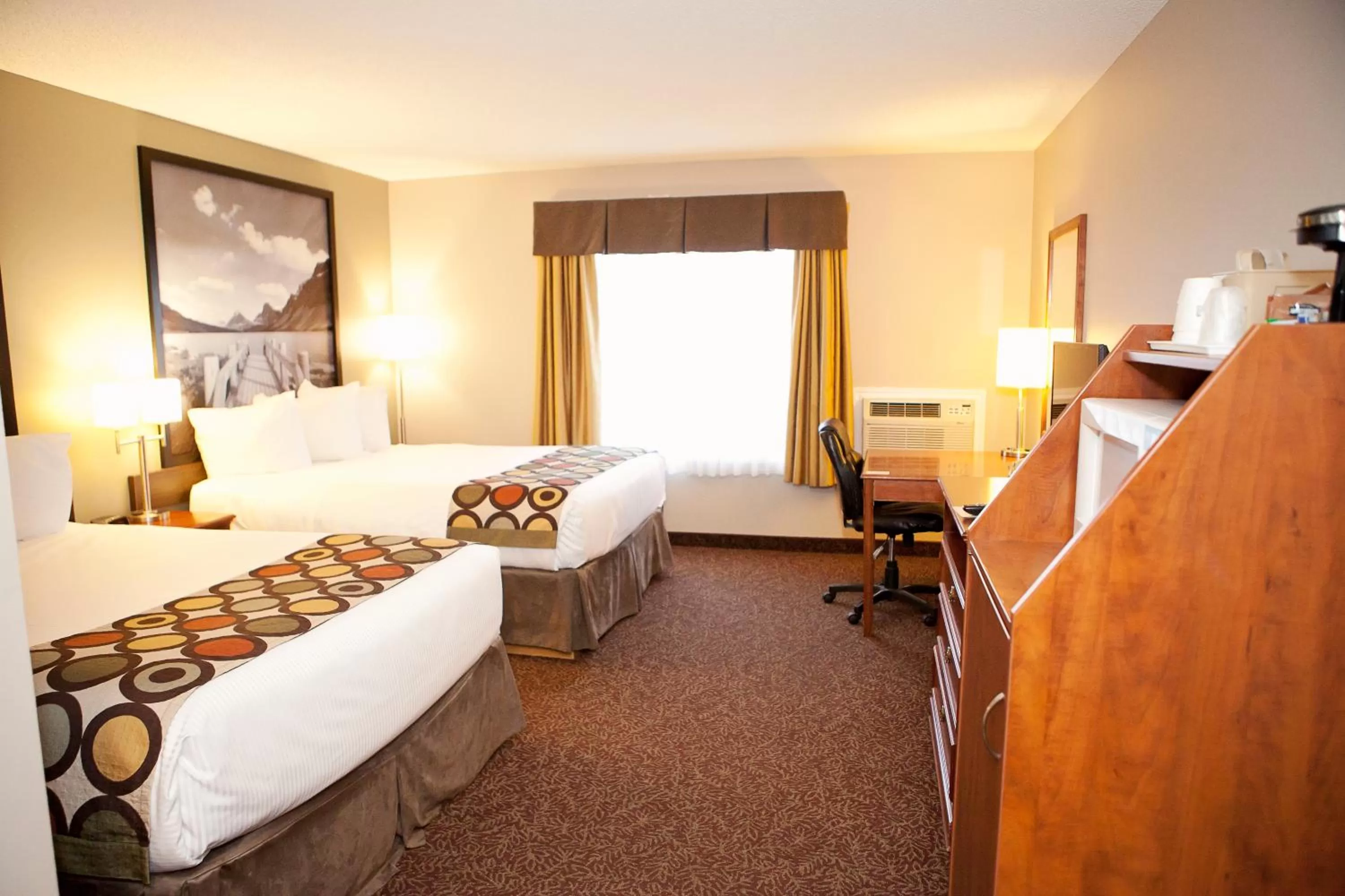 Bed in Super 8 by Wyndham Cochrane