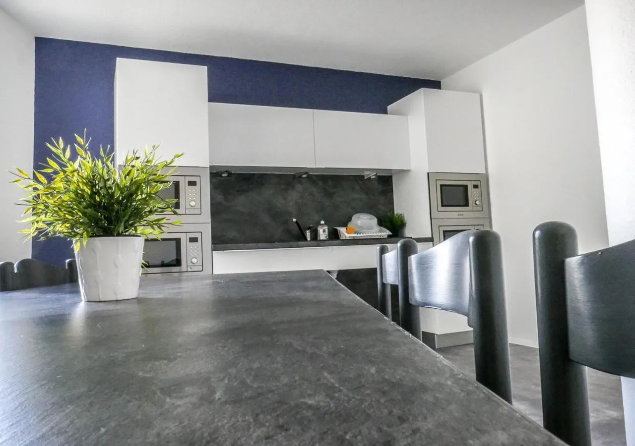 Communal kitchen in Hôtel des Thermes Les Dômes