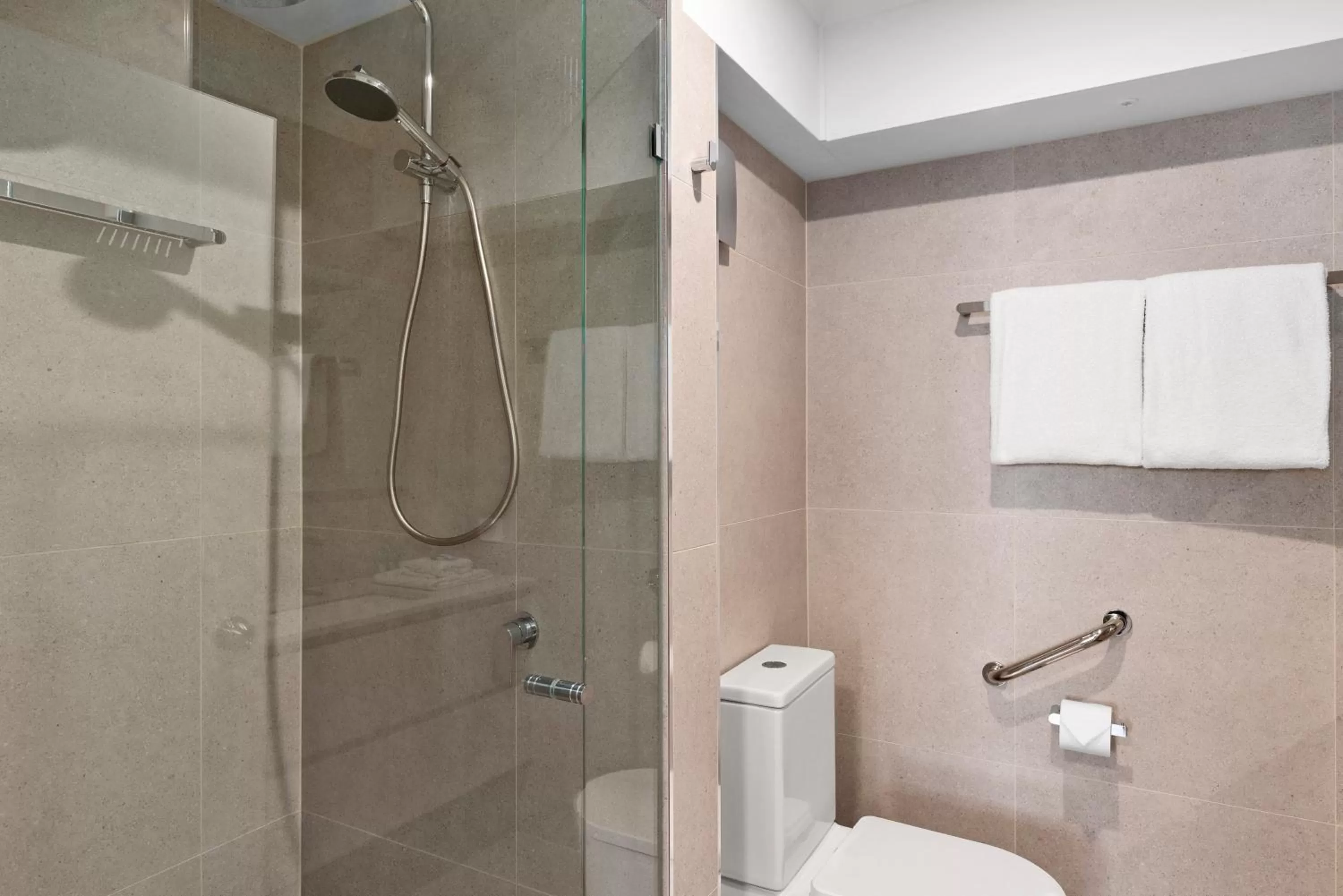 Shower in 84 The Spit Holiday Apartments